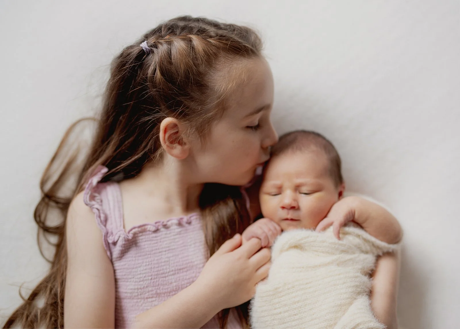 Newborn with sibling