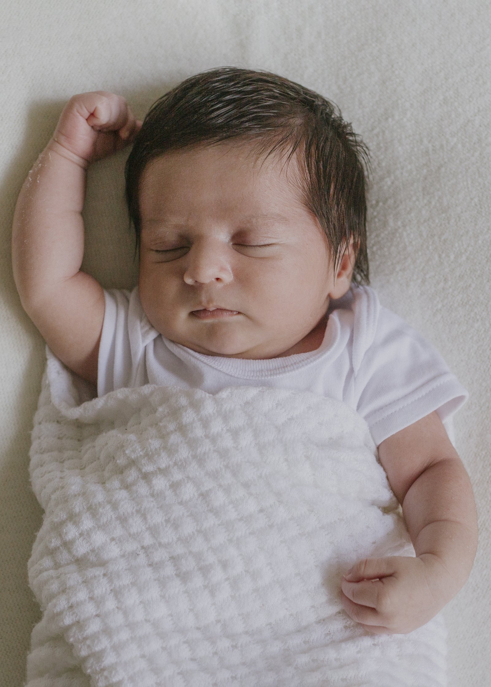 Newborn baby stretches