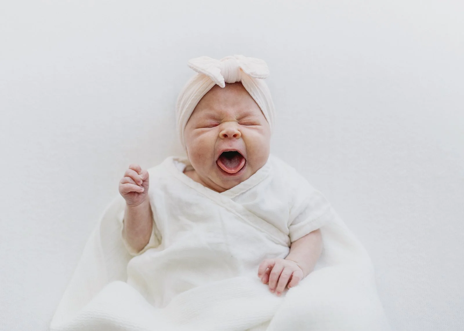 Newborn baby yawns