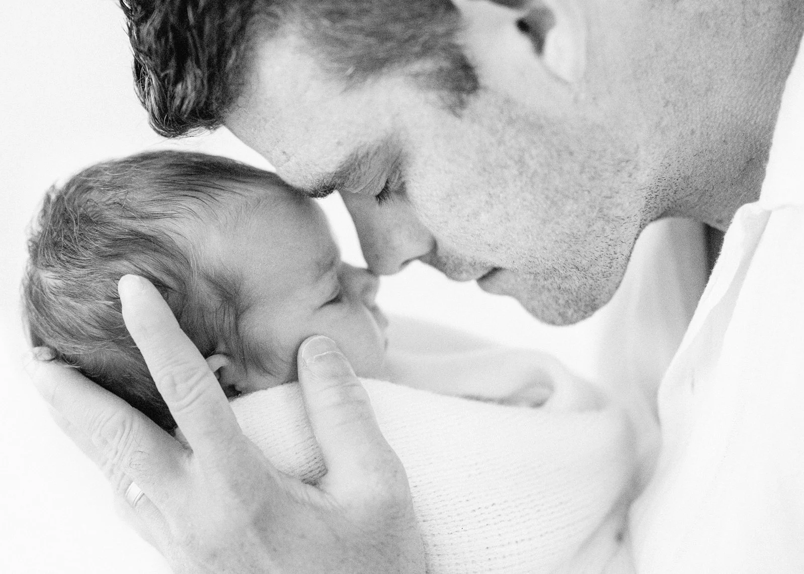 New father with his newborn baby girl