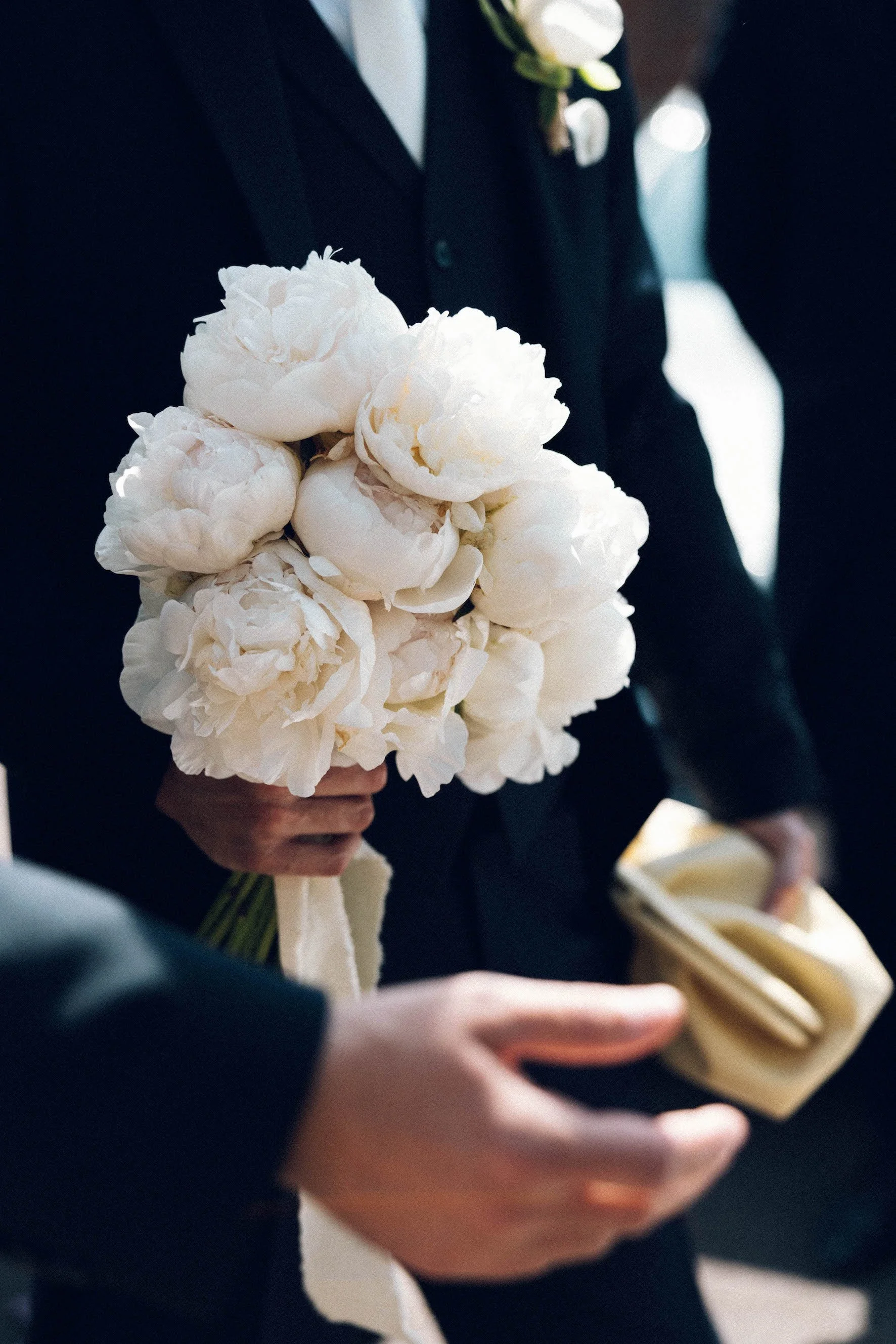 bruidsboeket in handen