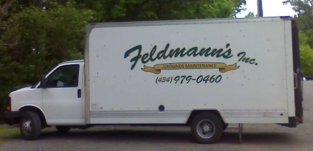  Image of Feldmann’s Inc. work truck located in Charlottesville along with Morris Lawn Care and Services. 