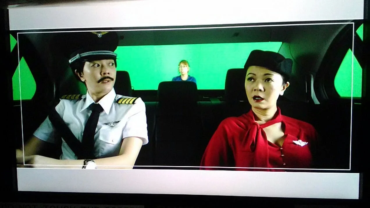 Michelle Chong as the air stewardess and pilot in OCBC OneTouch TVC