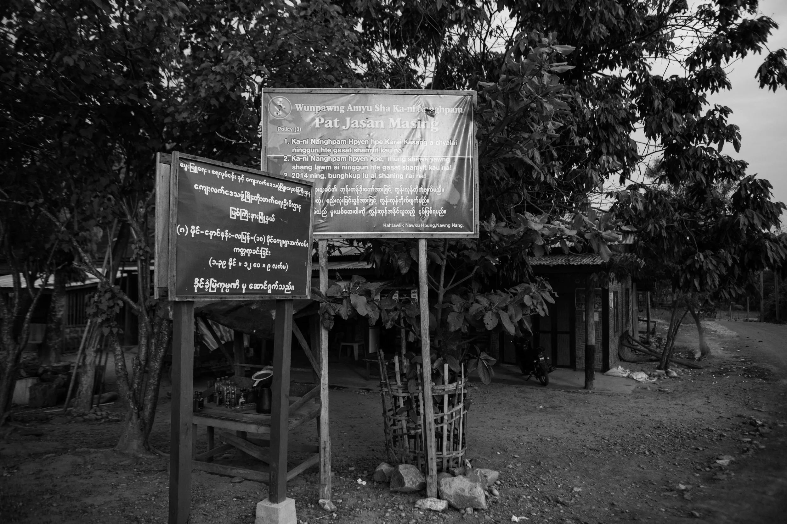 Signs like these popped up around Myanmar's northern city of Myitkyina and surrounding villages last year. They announce a mission to wipe out drugs. The Patjasan program is a collaboration between the Kachin Baptist and Catholic church.