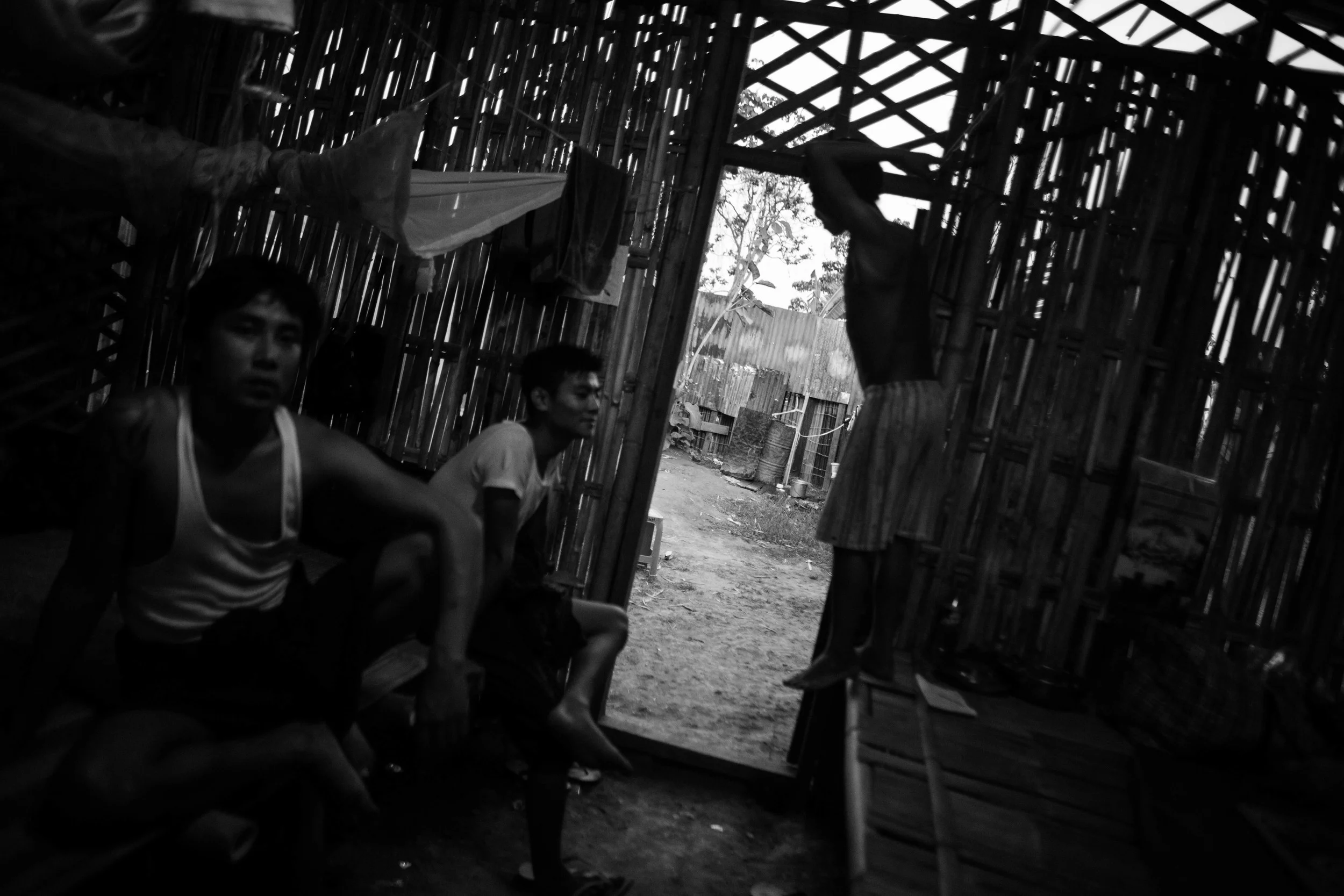 New students at the YCC peer outside from the "prayer room."