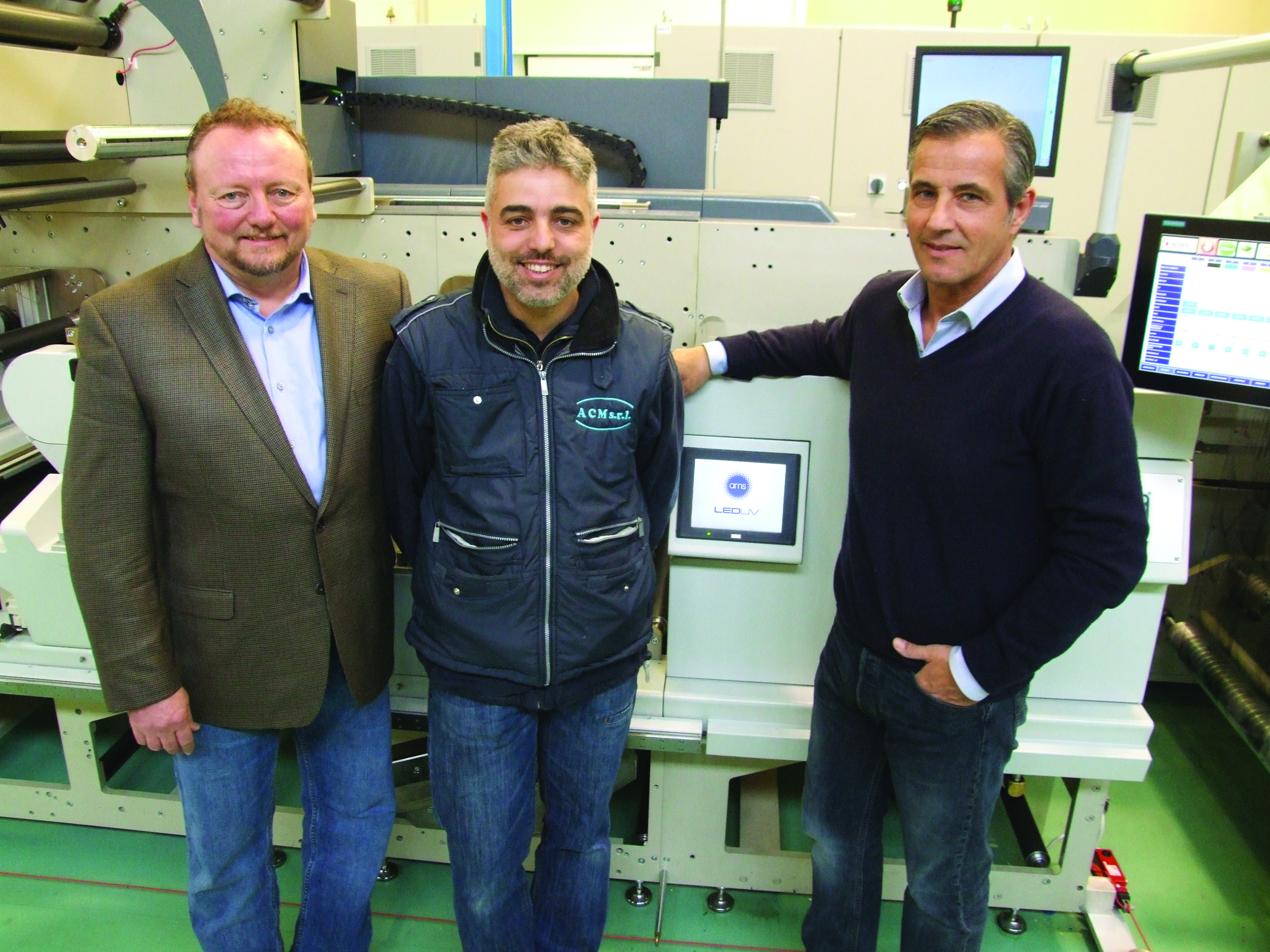 From left: Andy Ross, AMS VP of Worldwide Service, Alessandro Comanduli, ACM and Paolo Nascimbeni, AMS European Sales at the AMS LED UV Control Screen.