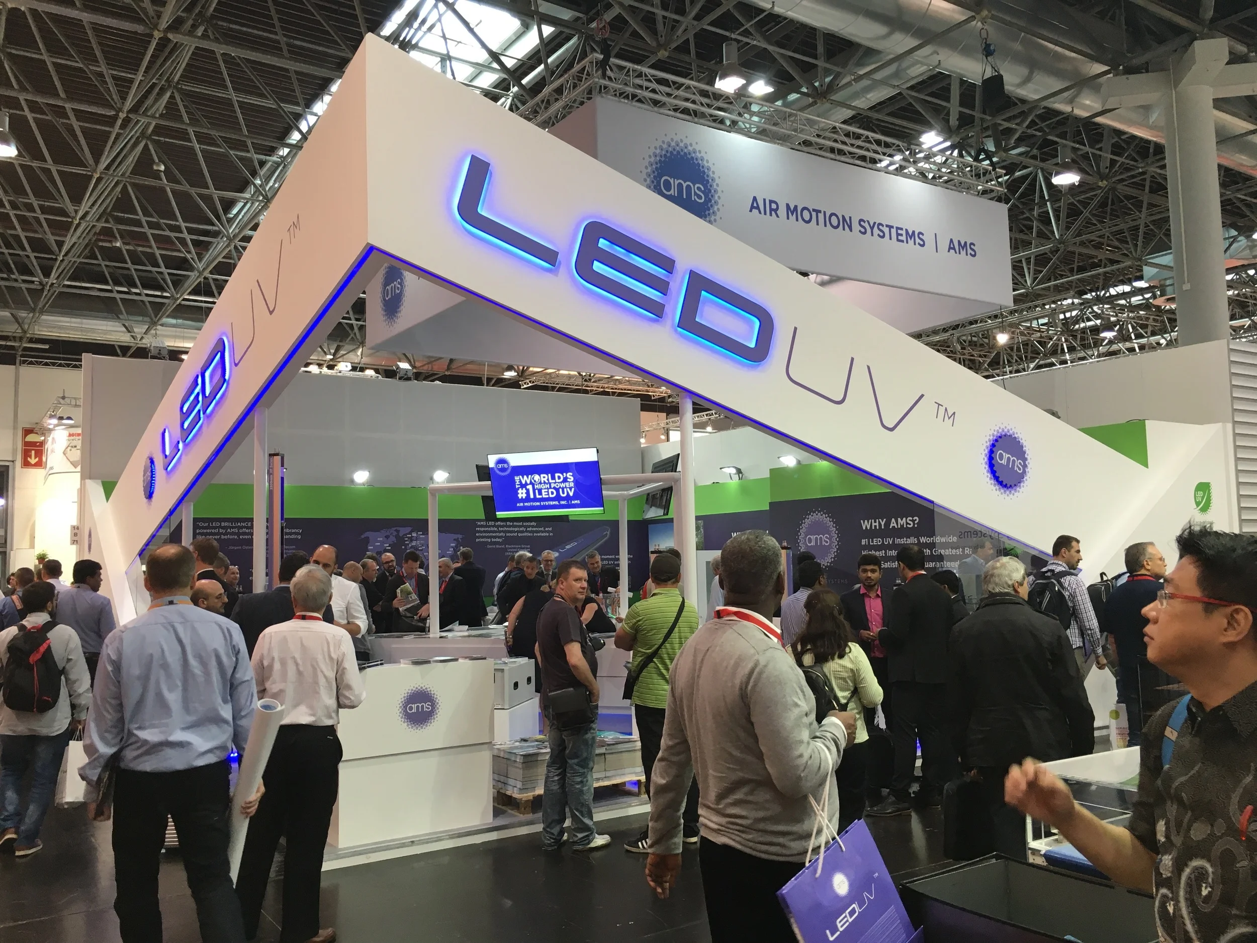 The AMS Stand in Hall 14 was often standing-room only as visitors from numerous countries witnessed the unique power of LED UV printing displayed on a wide range of brilliantly printed samples.