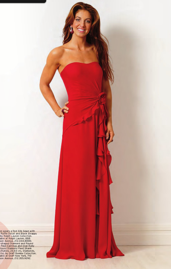 Lauren wears Red Silk Gown with Rose Ruffle Detail and Black Strappy by Ralph Lauren Collection. Multi Shaped Diamonds and ROund Ruby Pavé Earrings and Oval and Round Diamond Pavé Shank Ring. 