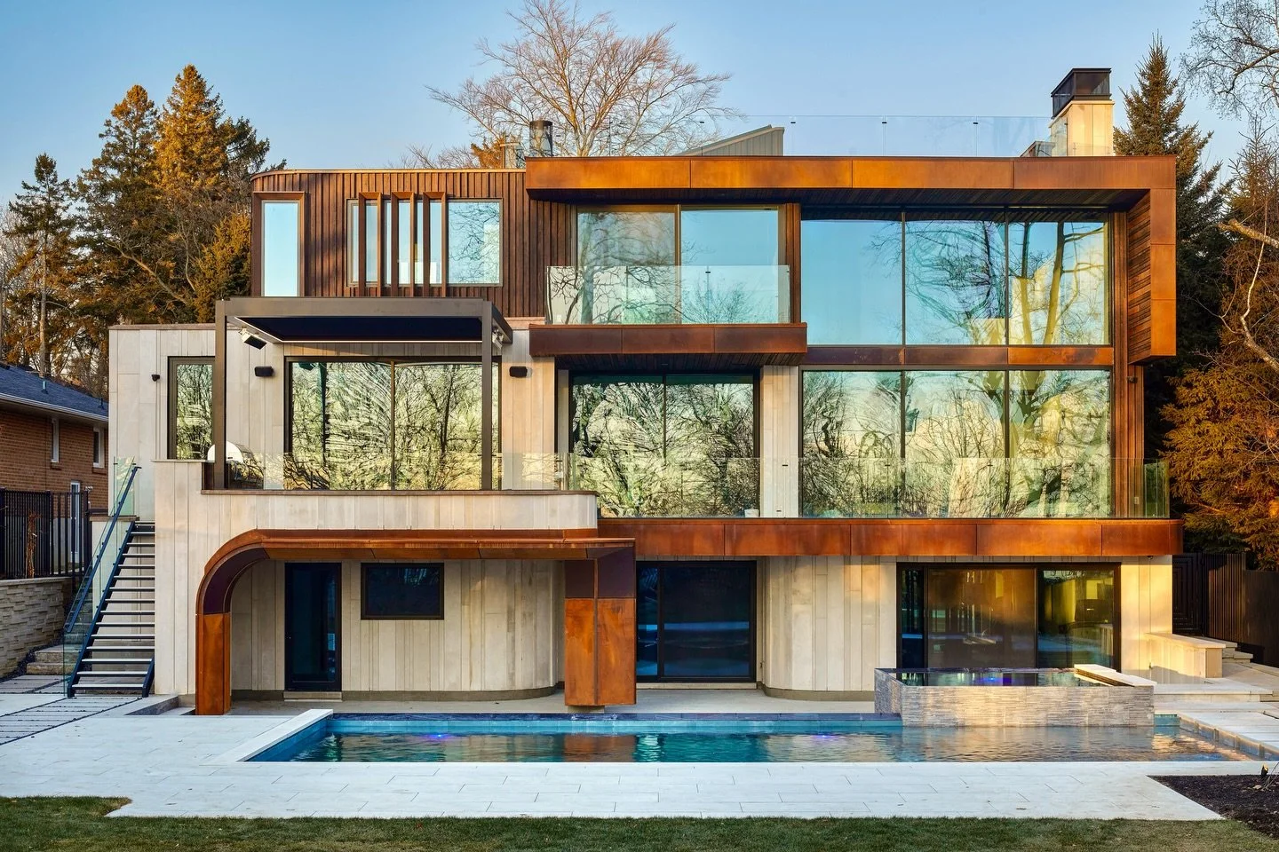 Hard to believe this is the same view. 
From framing and sheathing to a fully realized rear elevation. 

#CustomHome #ModernHome #HomeTransformation #LuxuryHomes #ModernArchitecture