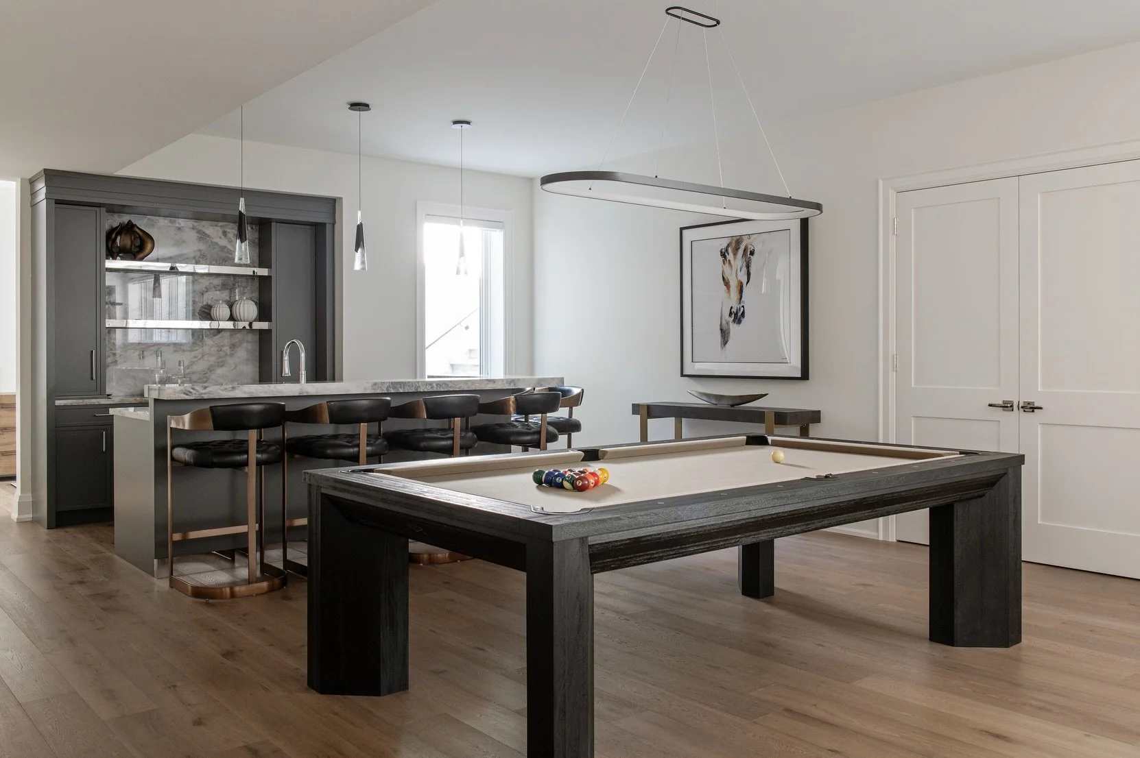 The kind of basement that actually gets used.
Pool games, drinks at the bar, movie nights, and a space designed to bring people together

Interior Design: @parkyndesigninc 
Custom Build: @eastonhomesinc 
Architecture: @new_age_design 

Photography: @