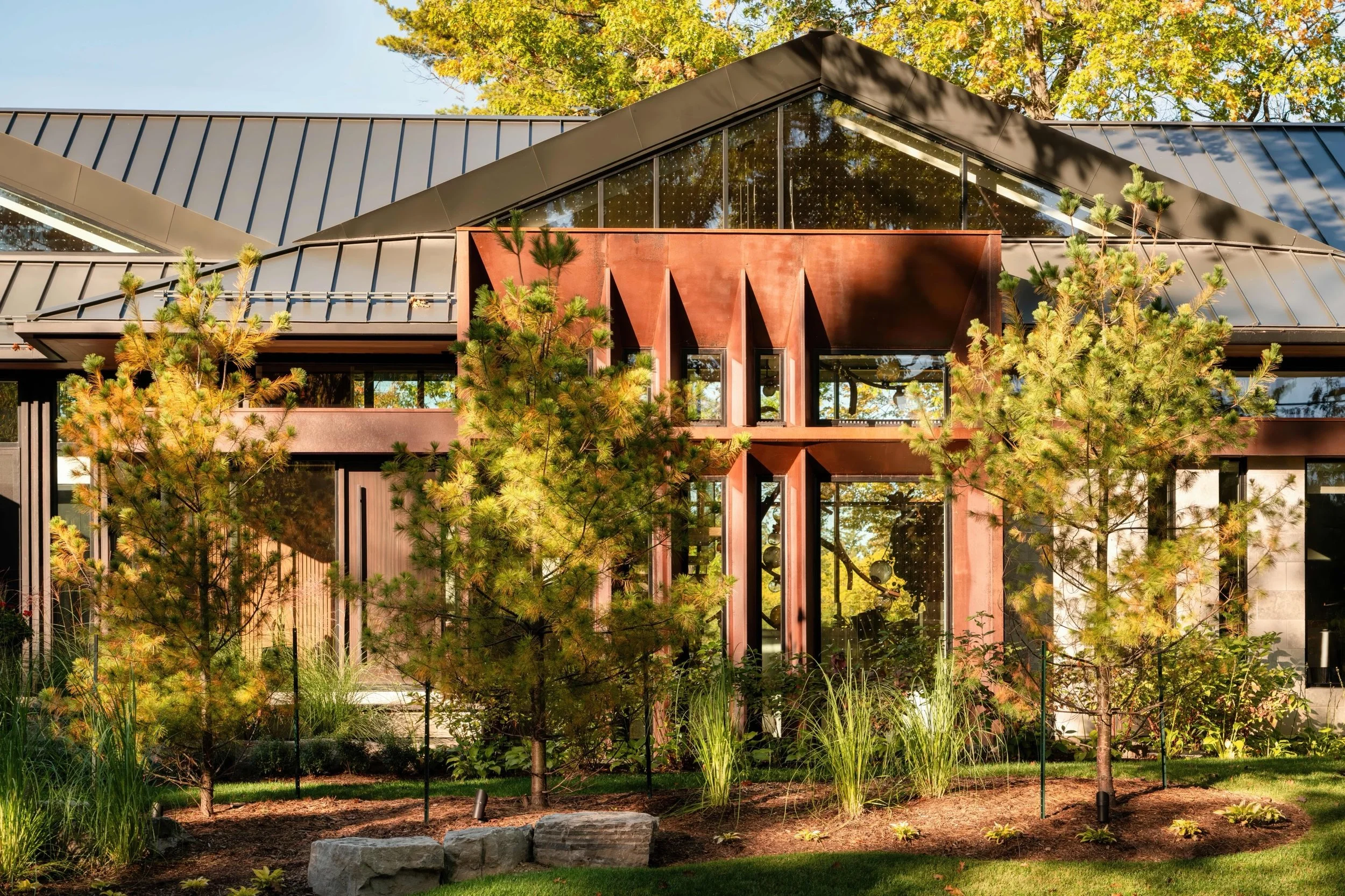 A closer look at the details that define this home.

Weathering steel, vertical wood screening, expansive glazing, and a sculptural standing seam roof layered into a residence designed to feel grounded within its landscape.

Every material was select