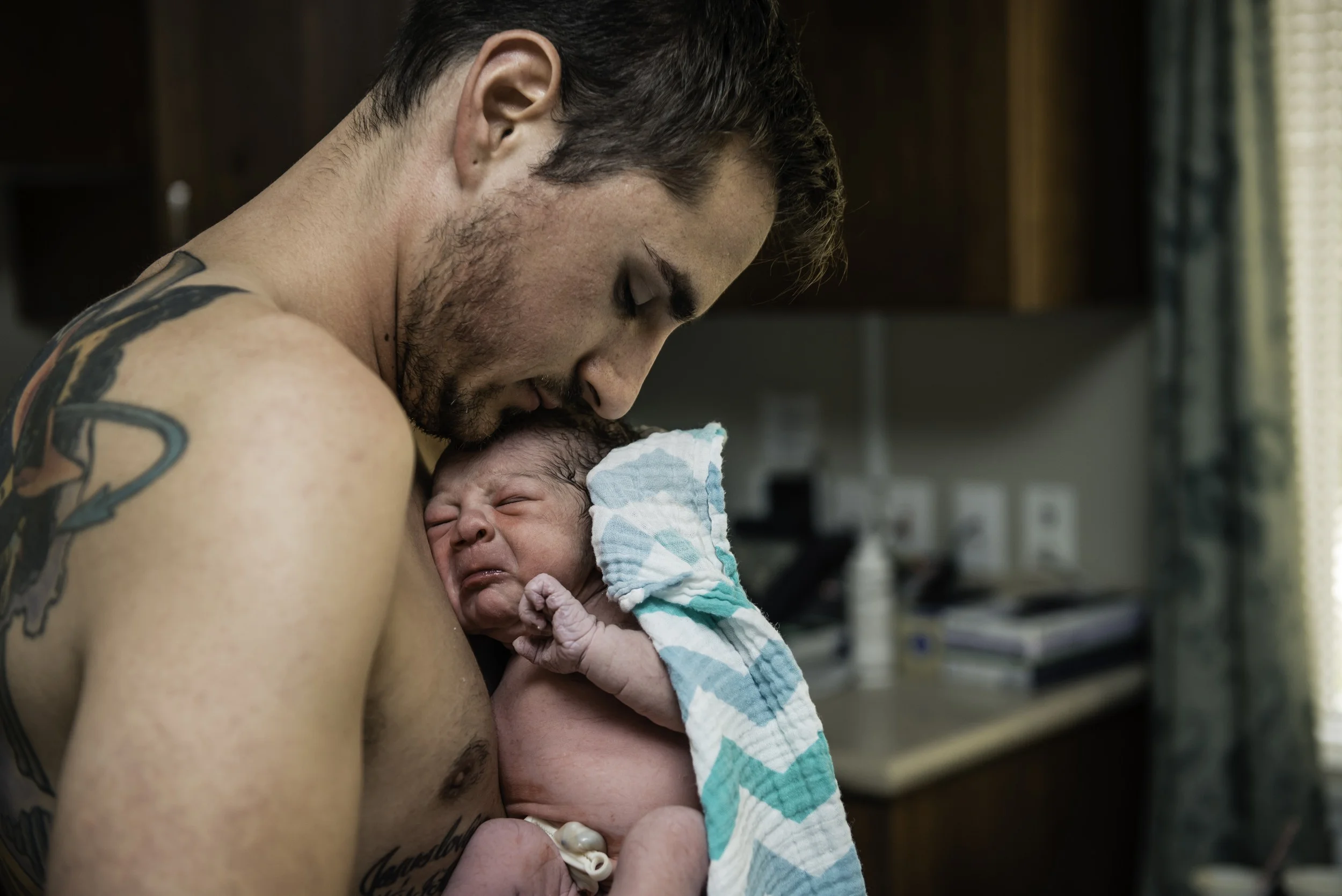 A-waterbirth-story-at-the-birth-center-in-Murray-utah-salt-lake-city-birth-photographer-birth-videography,-natural-birth,-homebirth-55.jpg