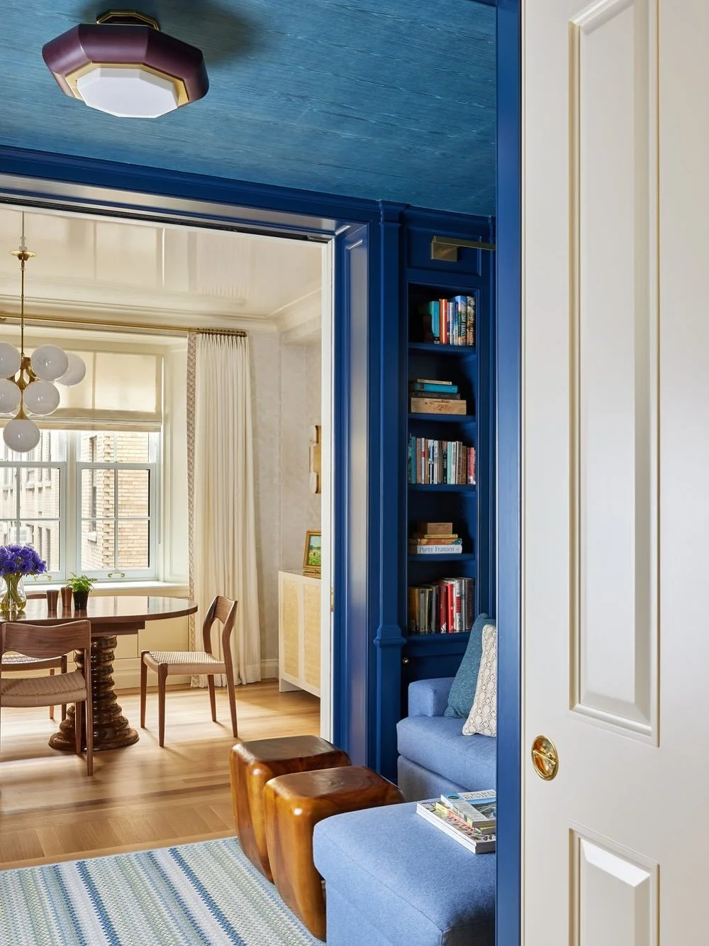 My favorite shot: the view through 💙 I love understanding how spaces connect to one another, especially when there is a space within a space. This library was cleverly carved out of a graciously scaled dining room and sits jist beyond some gorgeous 