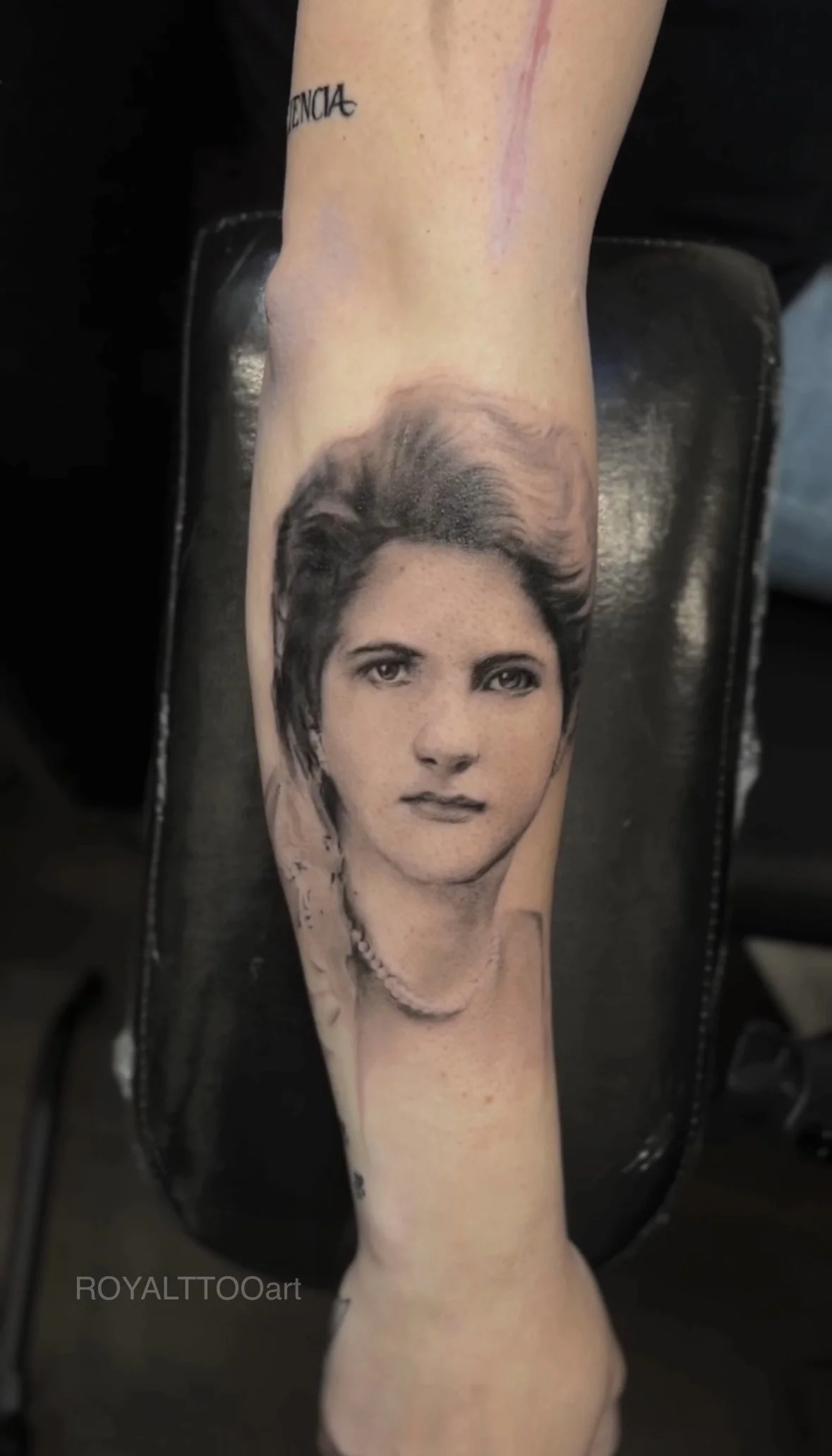 27-female-portrait-forearm-tattoo-black-and-grey-realism-nyc.jpg