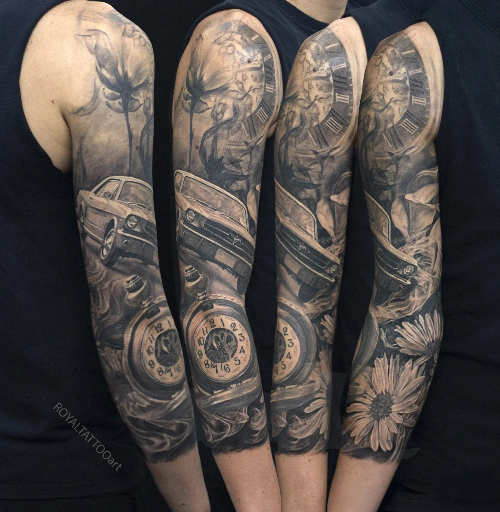 Black and grey realism full sleeve tattoo in NYC by Royal Tattoo Art, featuring a classic car, vintage clock, large flowers, smoke, and soft shaded background details across the arm