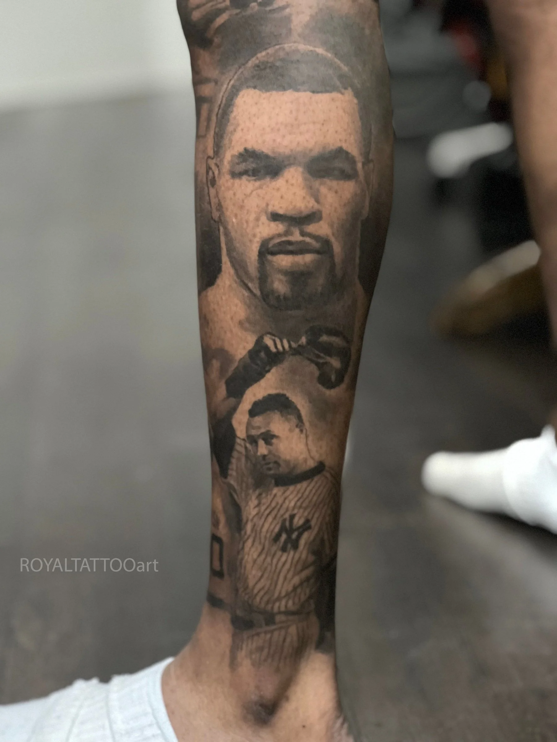 Black and grey Mike Tyson and Derek Jeter portrait leg sleeve tattoo, combining boxing and Yankees tribute imagery by Royal Jafarov in NYC.