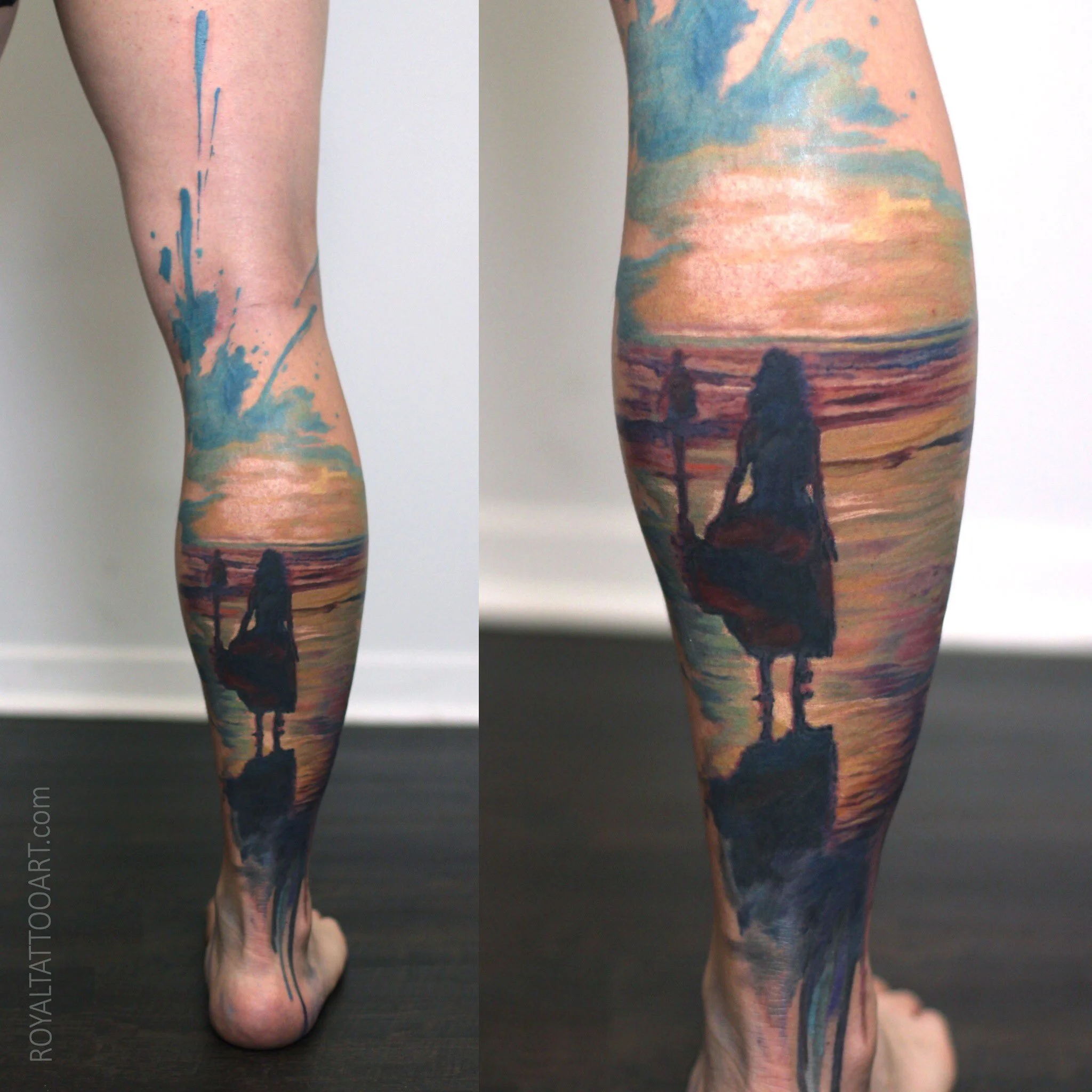 A pair of leg tattoos depicting a surreal sunset landscape with silhouettes and warm, vivid hues, executed in rich color realism across both calves.