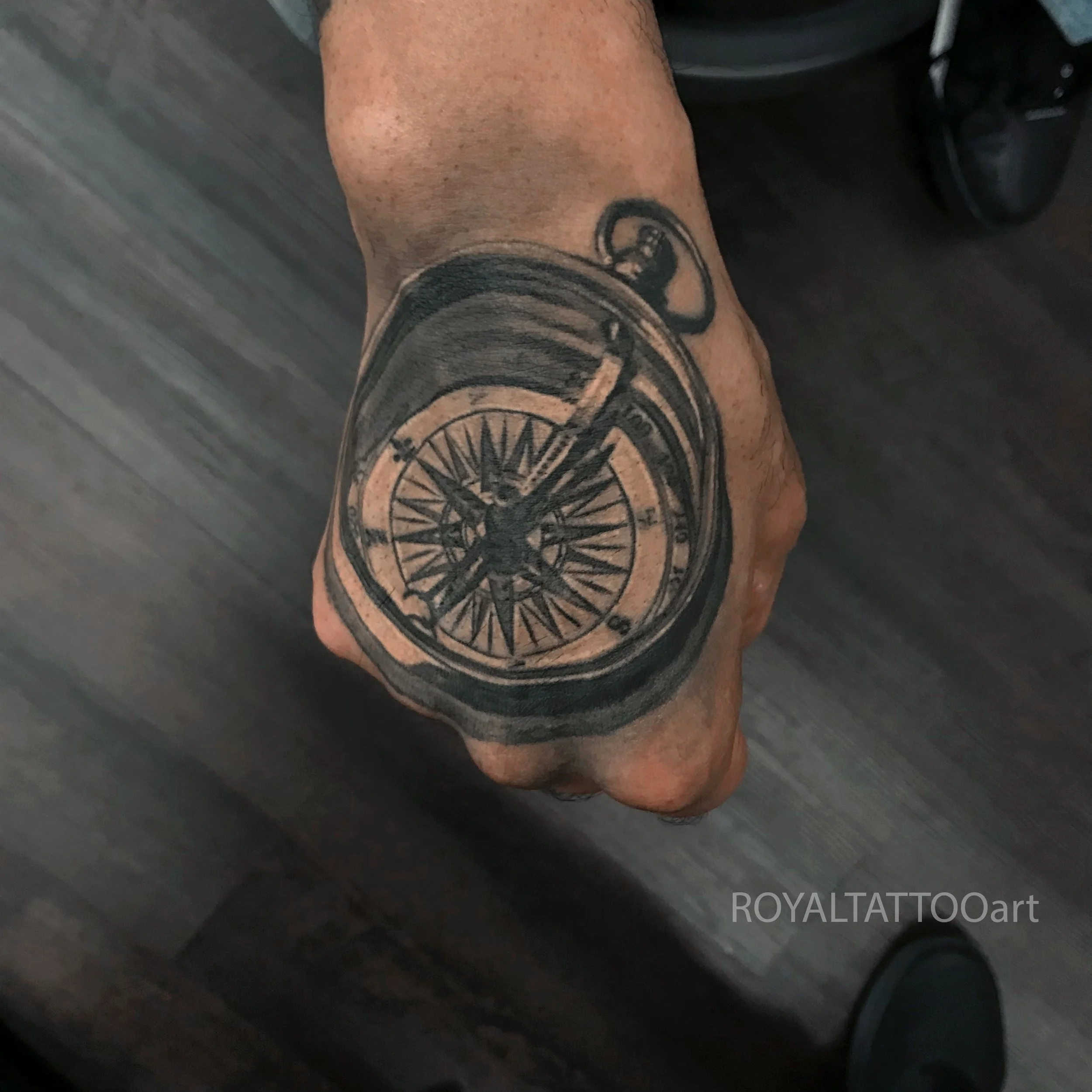 compass-hand-black-and-grey-realism-tattoo-manhattan-nyc-royal-tattoo-art.jpg