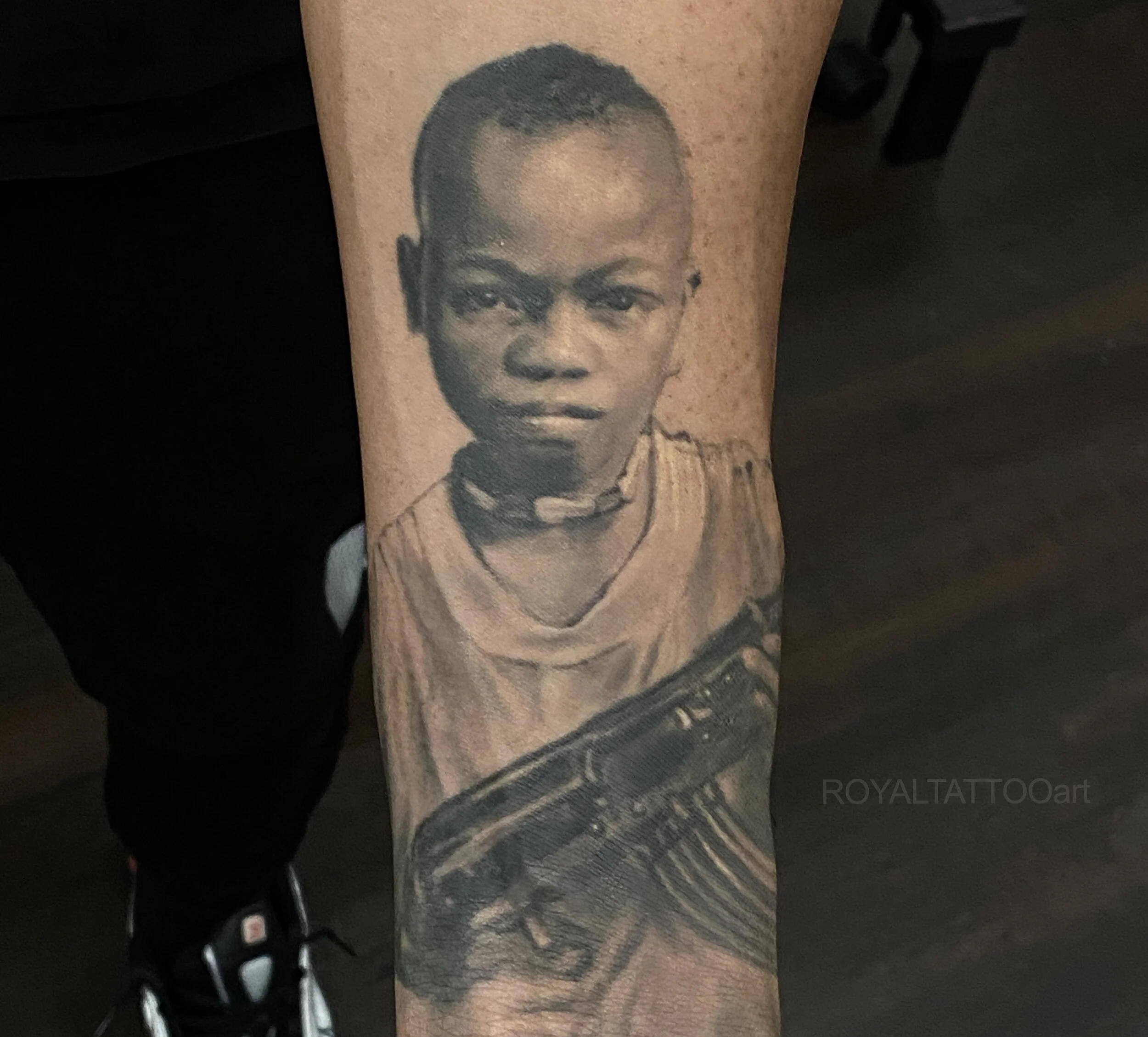39-child-portrait-arm-tattoo-black-and-grey-realism-nyc.jpg