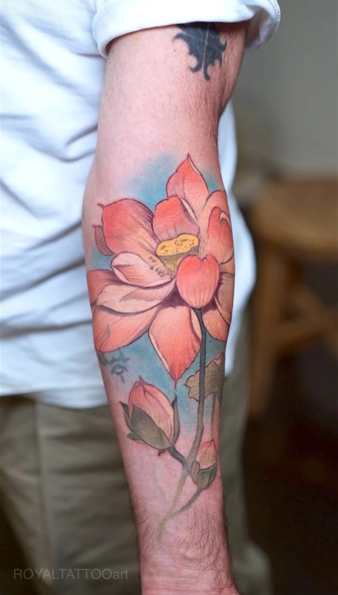 081-royal-jafarov-tattoo-flower-lotus-color-flower-tattoo-forearm-nyc.jpg