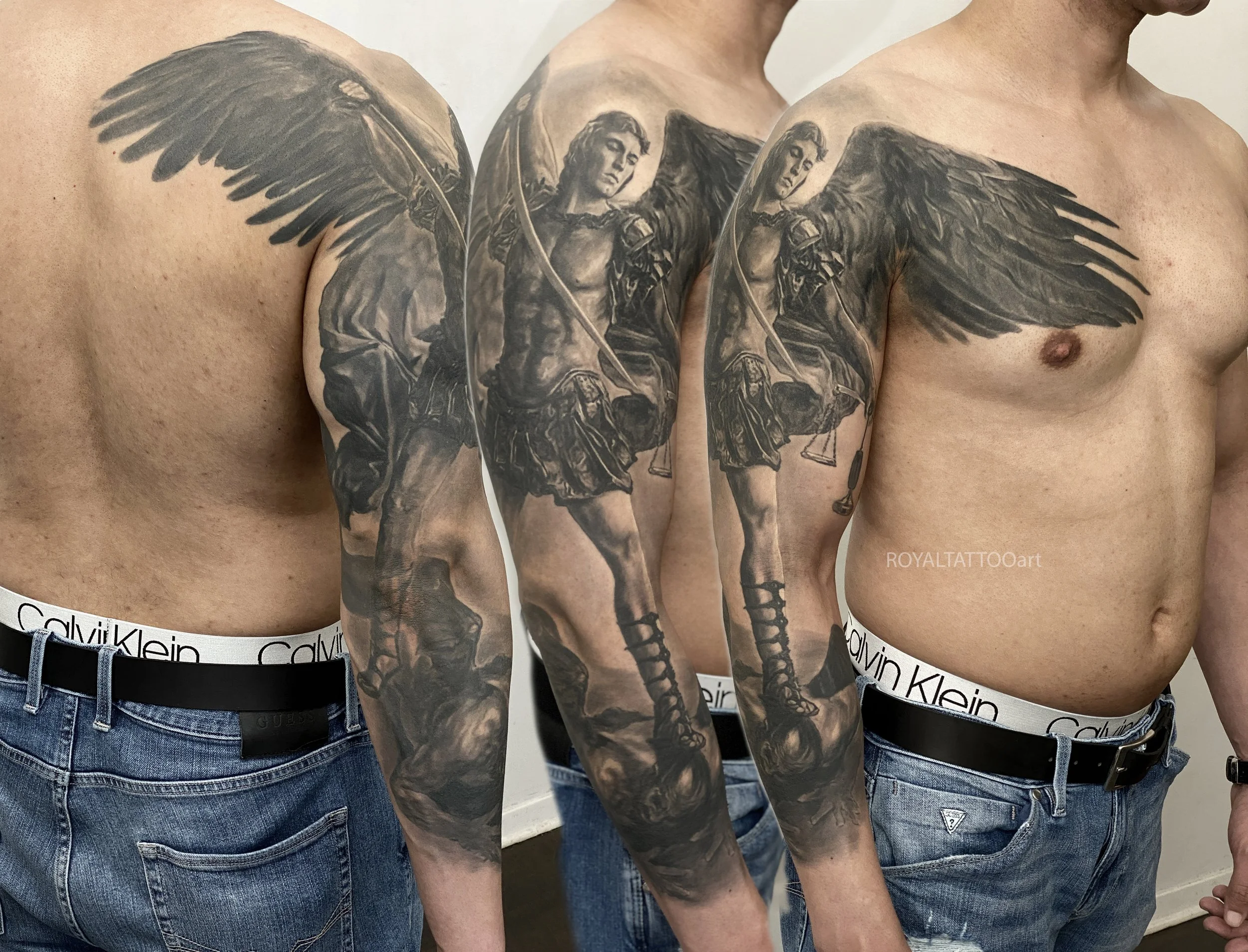 Angel Wings Black and Grey Realism Tattoo – Stunning large-scale angel wings tattoo in black and grey realism, spanning across the torso and arms. This breathtaking piece captures every feather detail with photorealistic precision by Royal Jafarov at