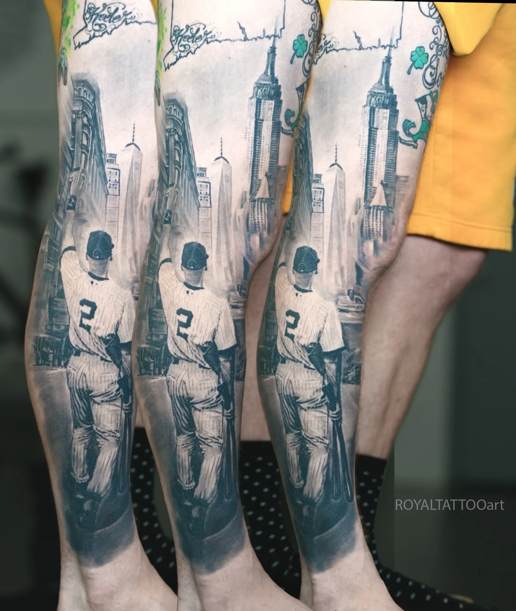 Black and grey Derek Jeter realism tattoo with the New York City skyline, honoring baseball, NYC, and portrait-style tattoo work.