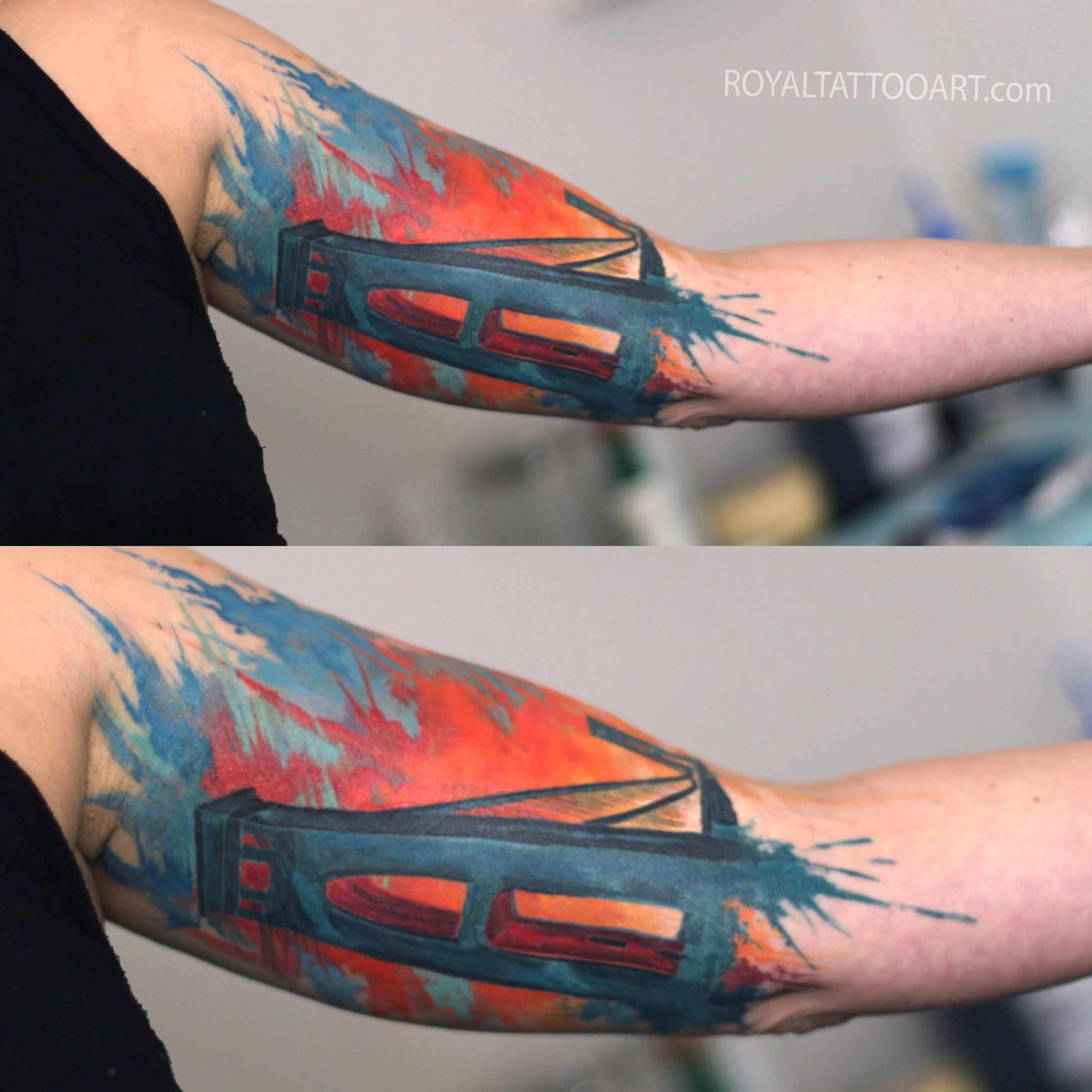 Vibrant abstract watercolor tattoo with bold orange, blue and red geometric shapes on forearm, contemporary ink design by Royal Jafarov at Royal Tattoo Art