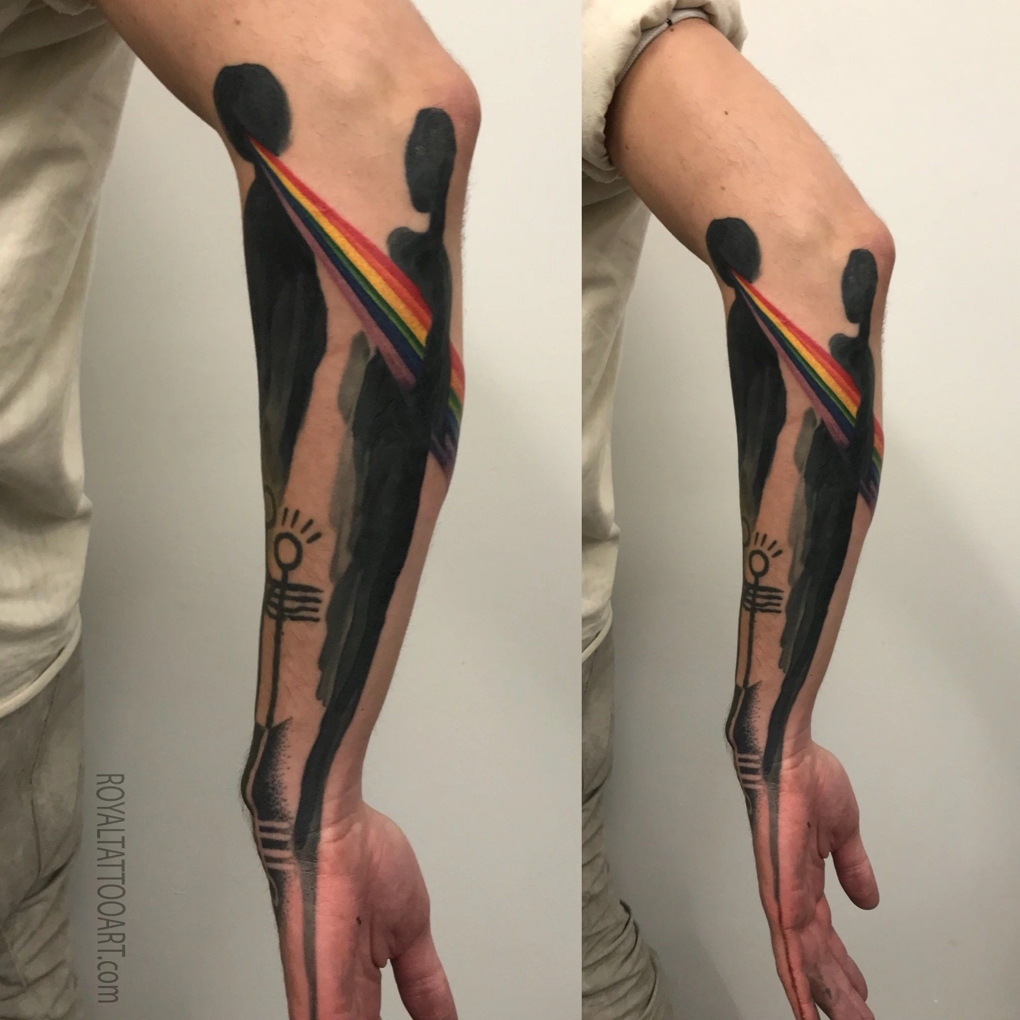 Abstract blackout arm sleeve tattoo with bold black ink and geometric color lines, avant-garde tattoo design by Royal Jafarov at Royal Tattoo Art