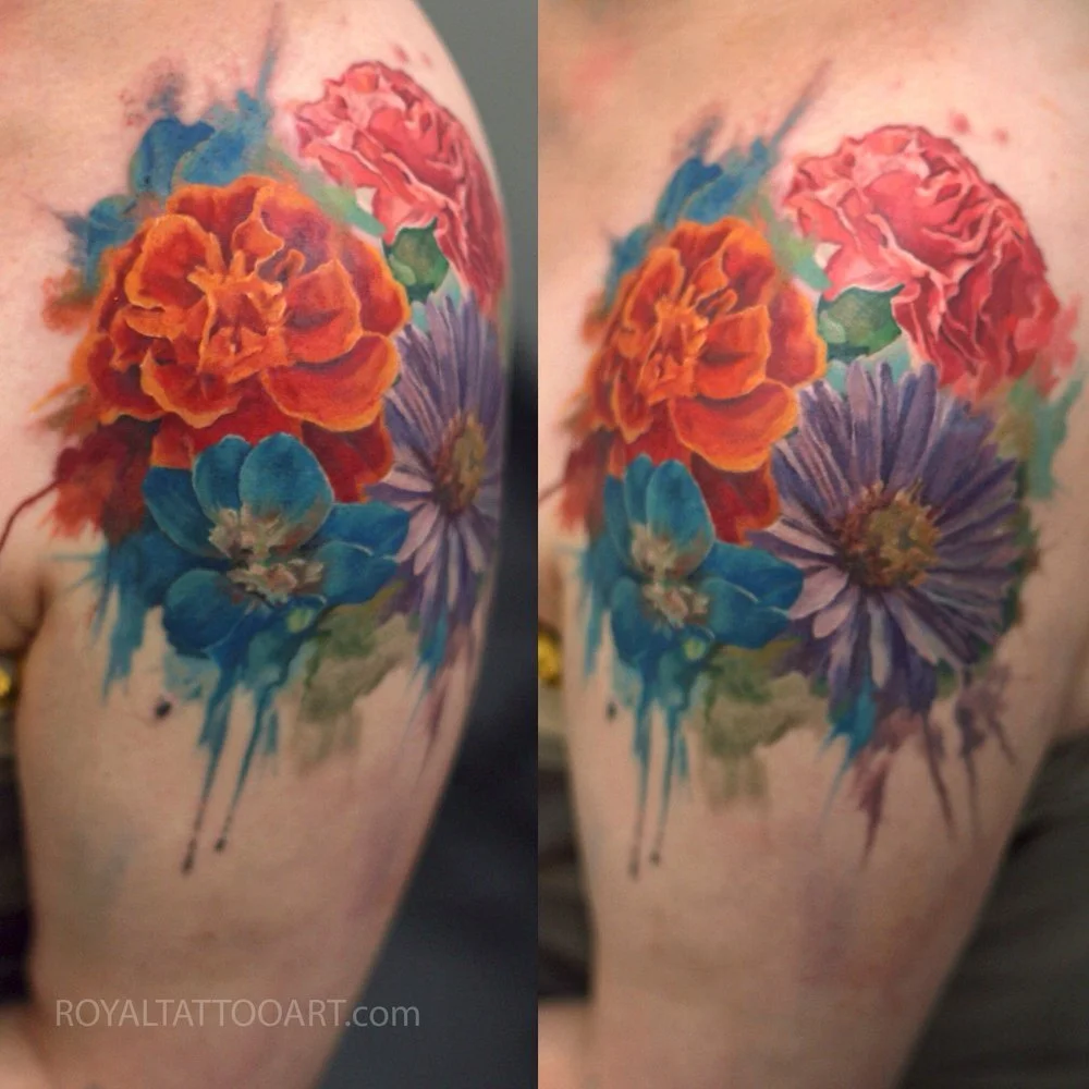 Colorful watercolor peony and daisy flower bouquet tattoo on hip and thigh, vibrant floral ink design by Royal Jafarov at Royal Tattoo Art