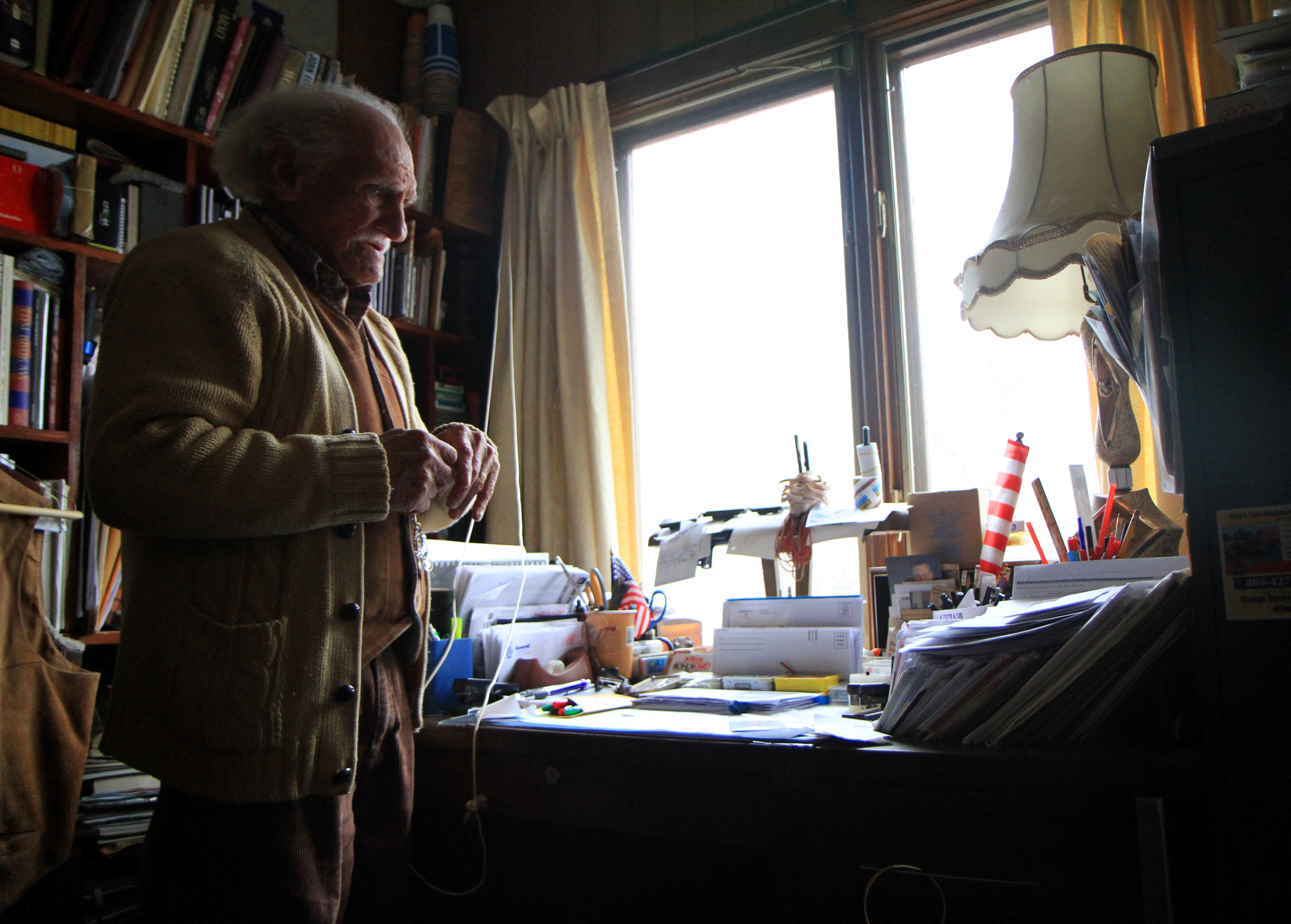  Donald Fida stands in his office the day before his wife, Paulette Fida, dies. "Life will be very hard for me without her," says Fida, "I counted on her in so many ways." Fida was afraid to spend more than an hour away from his wife while she was si