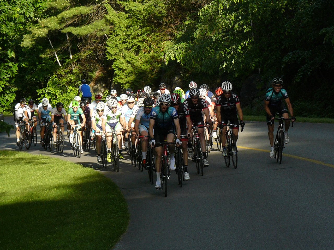 Pack tackling Pink Lake Climb. Photo credit goes to Doug Corner from Bike Race Ottawa