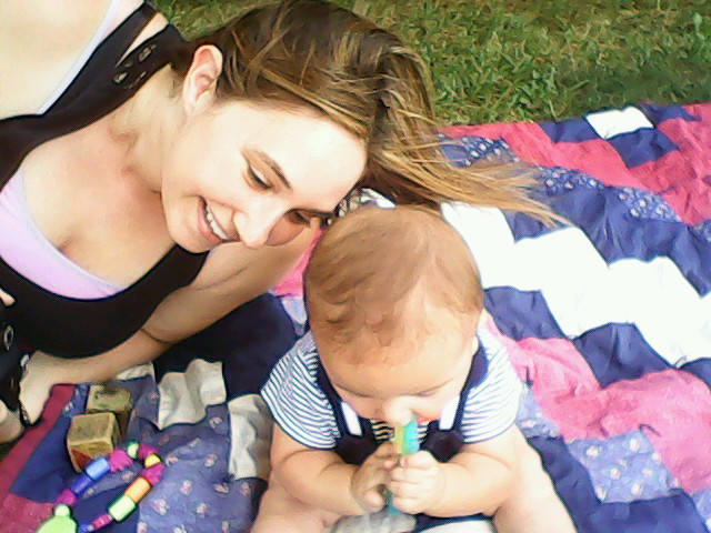 Photo of me smiling at baby Aedan in the mirror during a Portrait Session by 4 year old Ethan Savko 