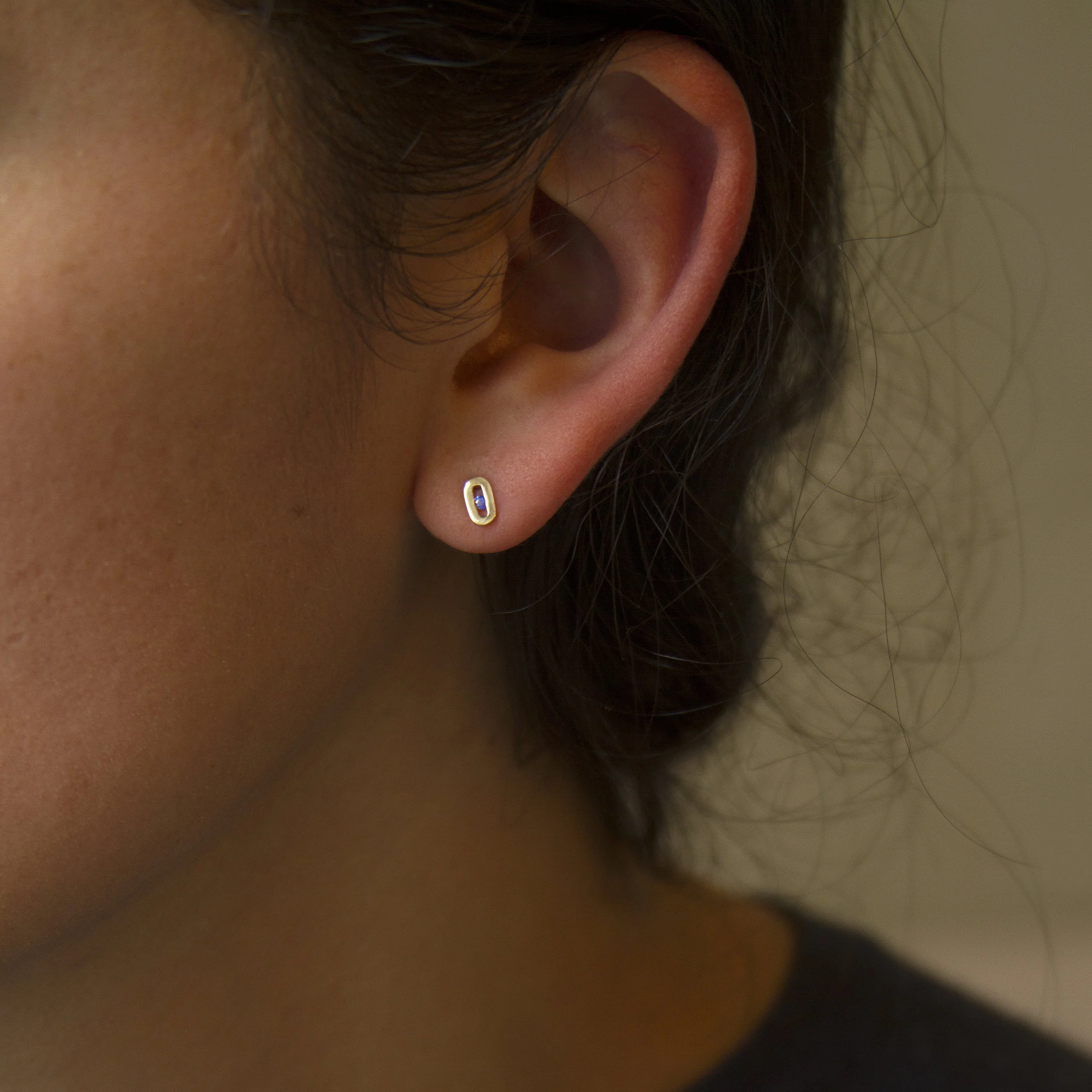 aurora i flicker sapphire on ear.jpg
