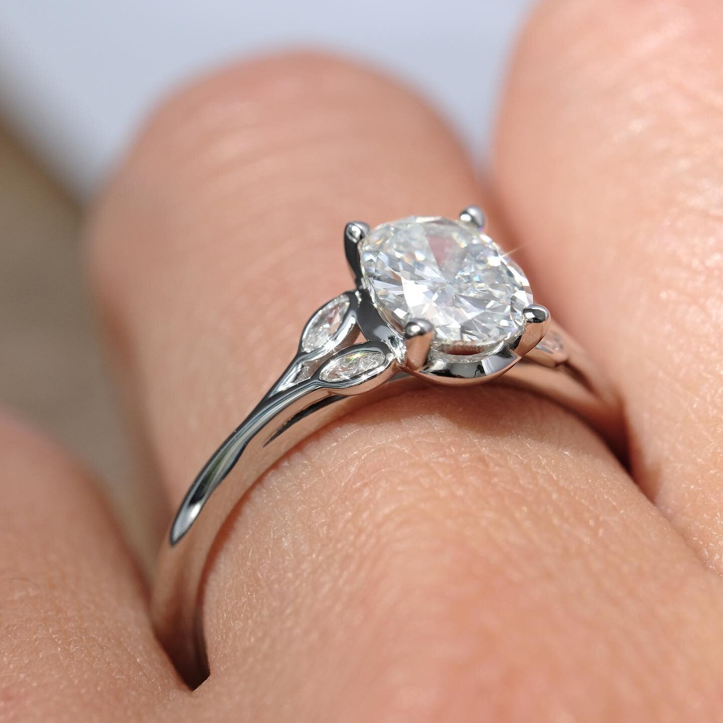 Sweeping curves, lovely little marquise stones and a big oval diamond add up to one perfect engagement ring. 

This was another ring that ended up in suspended animation while production had ground to a halt. But true love lasts, and now this stunner