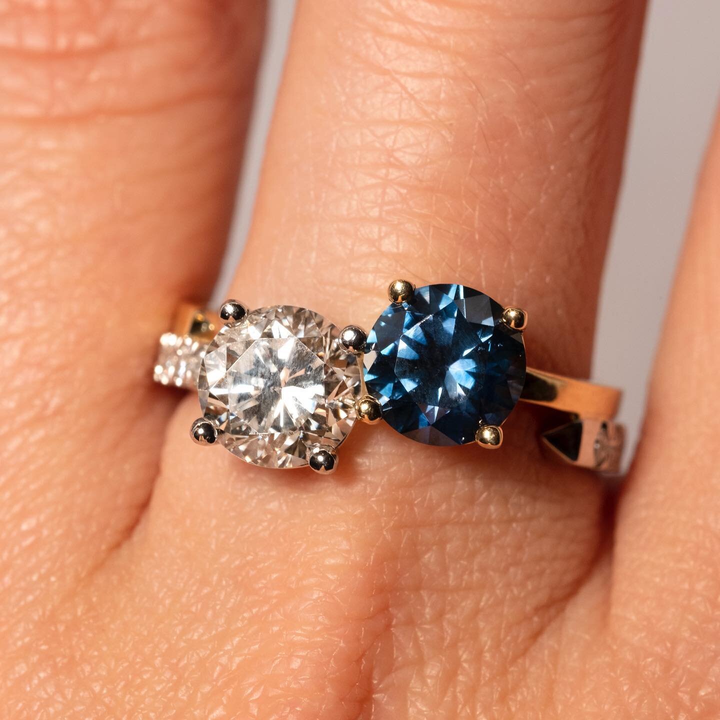 Toi et moi, pour toujours 🤍💙 The most romantic ring style, modernized. We matched a vintage diamond with a fiery Montana sapphire for a pairing that will stand the test of time. 
Love to you and your valentine today 💙🤍