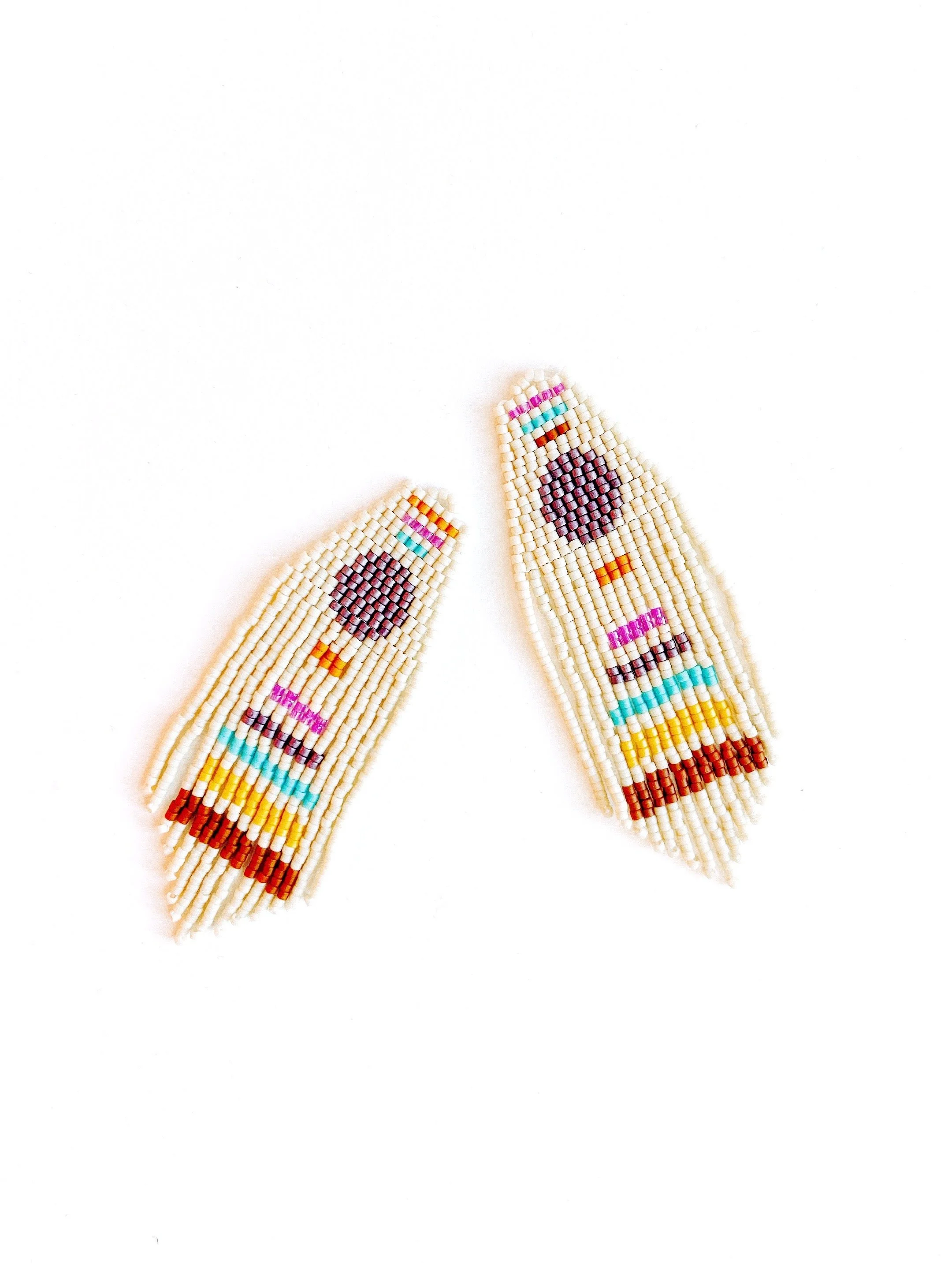 BRASS ELEPHANT COLLECTIVE
CERAMIC HOUSEWARES AND VASES
HANDMADE BEADED JEWELRY
BOHO