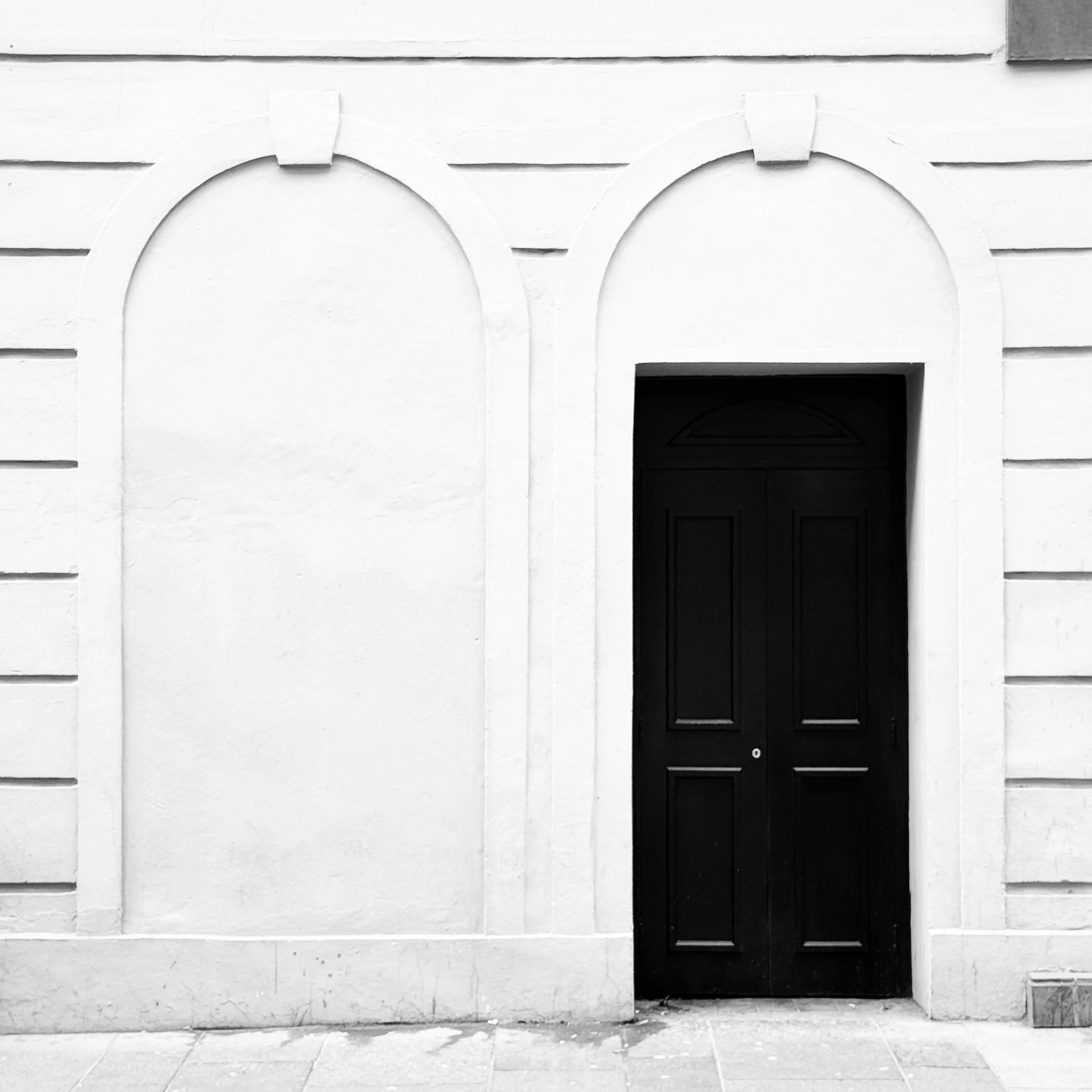 The Door

I have walked past this doorway many times, more recently I have seen it from a photographic perspective. More often than not shadows disrupted the scene for me but at the weekend I got a shot I am happy with.

The gloss on the door, the ma