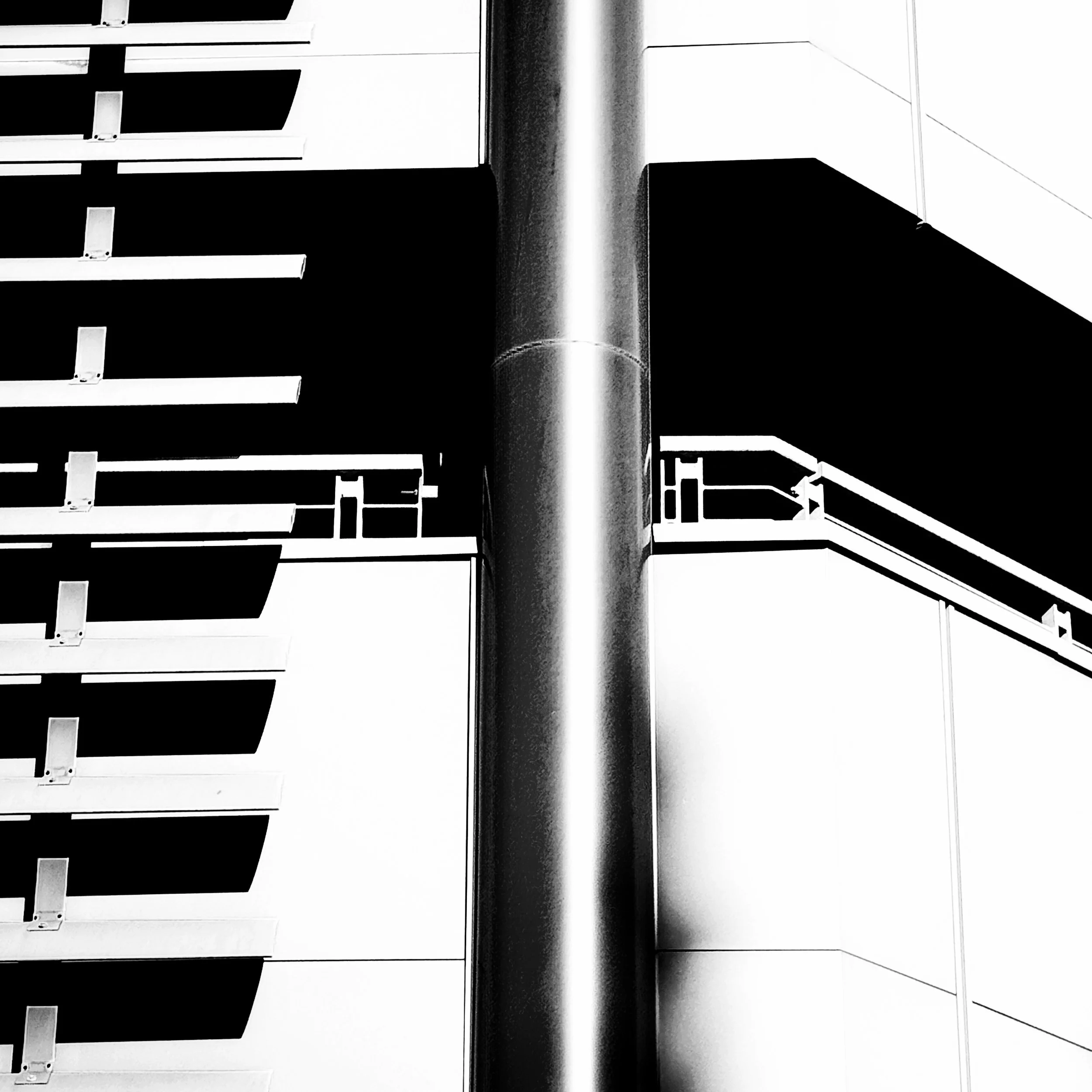 The sun was out yesterday and there were some great locations I came across with wonderful shapes and shadows which work well with a nice contrasting look.

I shot several different compositions but this one jumped out the most.
