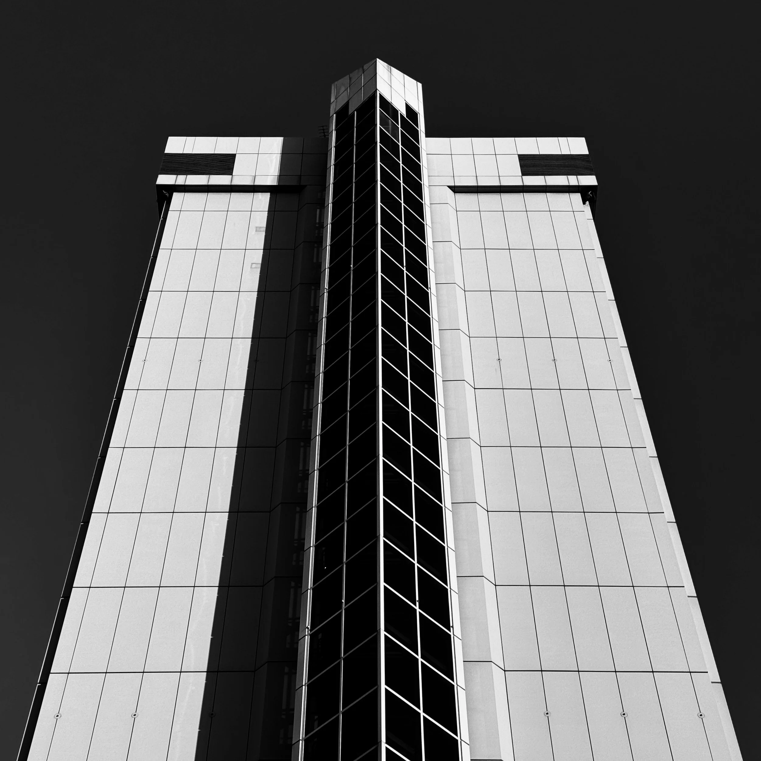 Beautiful light one early morning in the big smoke on my way to the office.

As I passed by this building the shadows jumped out at me and I could immediately visualise the strong contrast when black and white.

Another week, another building, my wee