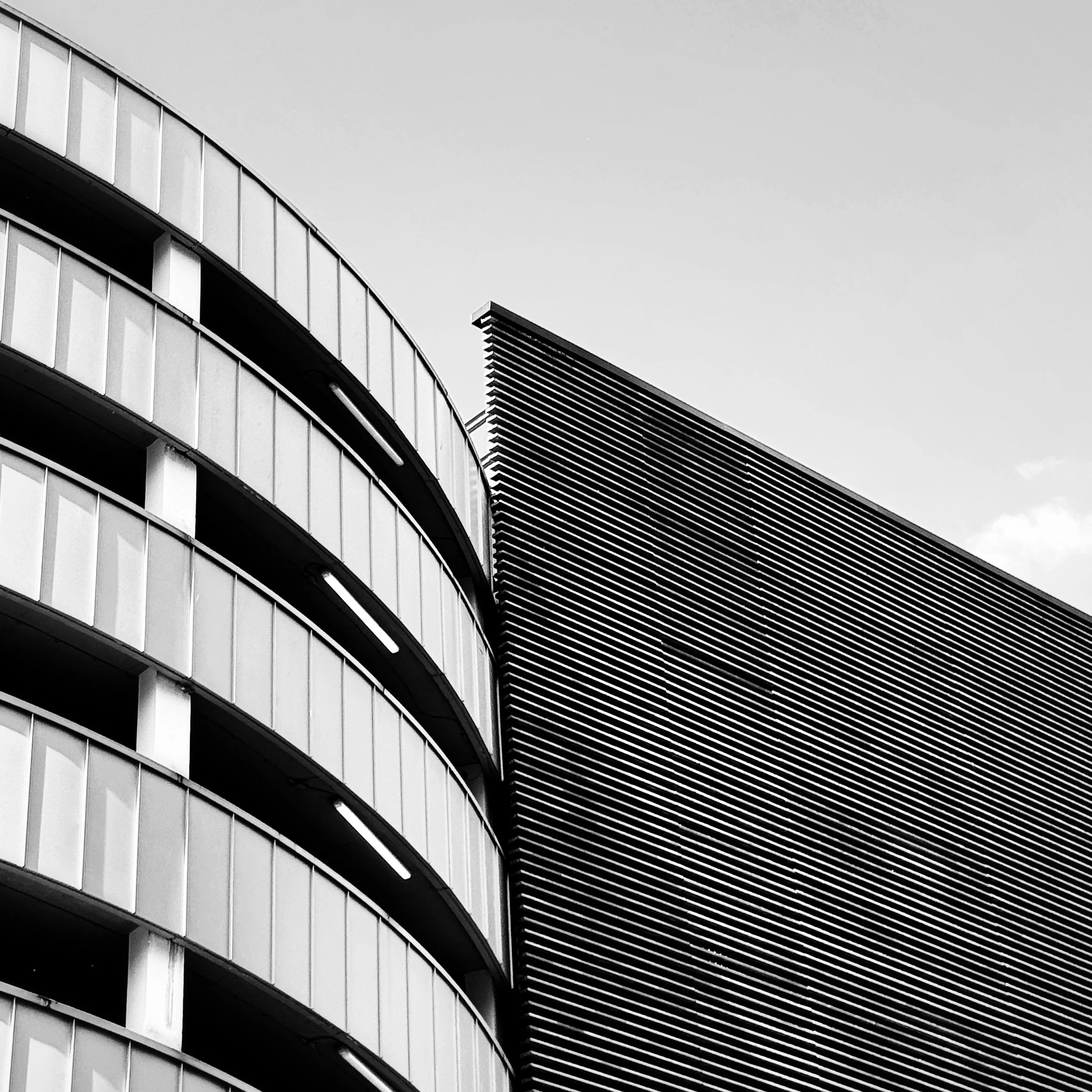 A walk around town in the midday sun for my #weeklyphoneimage.
This was a location I had previously walked past a few months ago and felt it would have potential with some nice shadows but an interesting variety of shapes and materials.