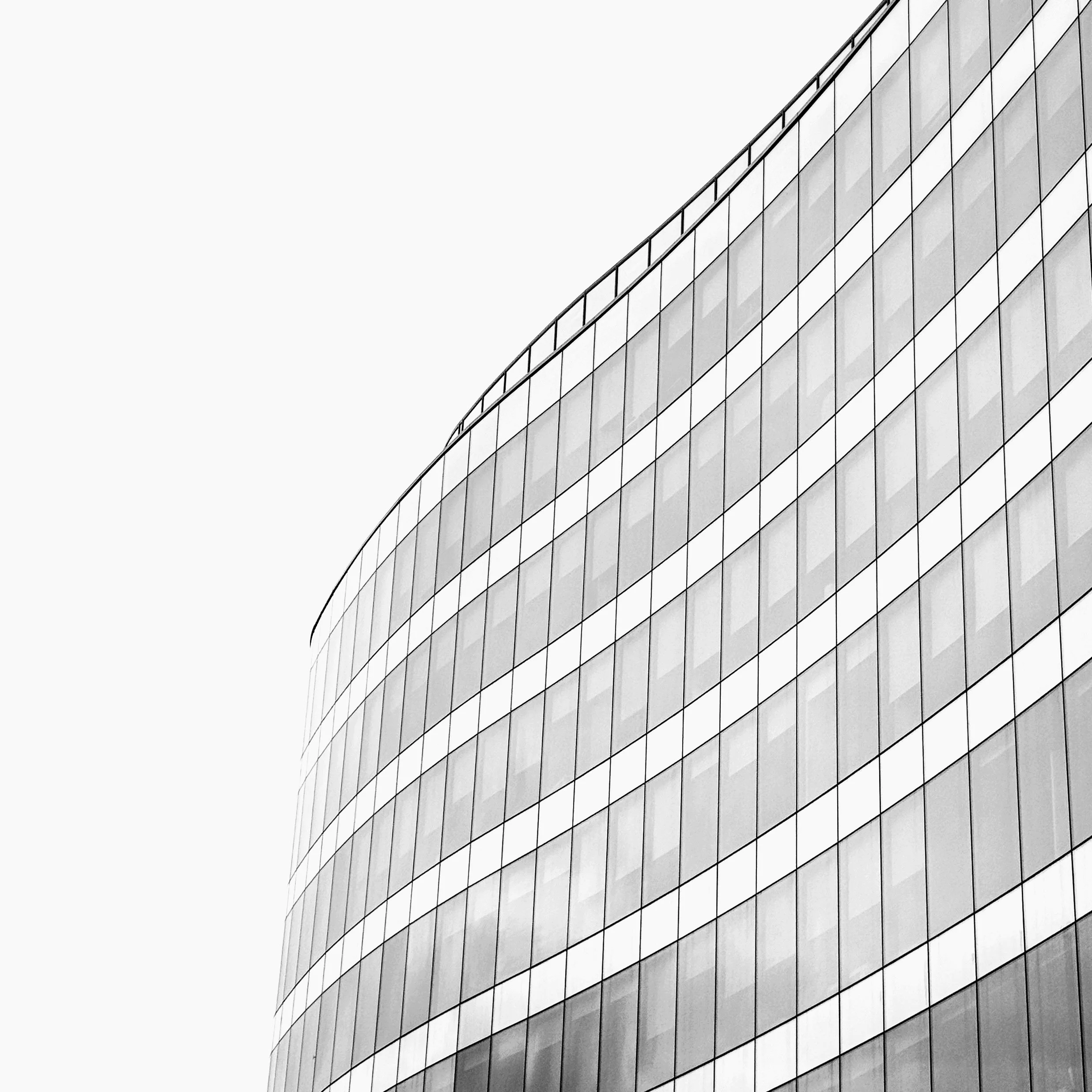 Until Sunday afternoon I didn’t have many great options but there was one local location I was going to visit before I ventured into the centre.

I took several shots of the curves and reflections of this building and this is my favourite of the lot,