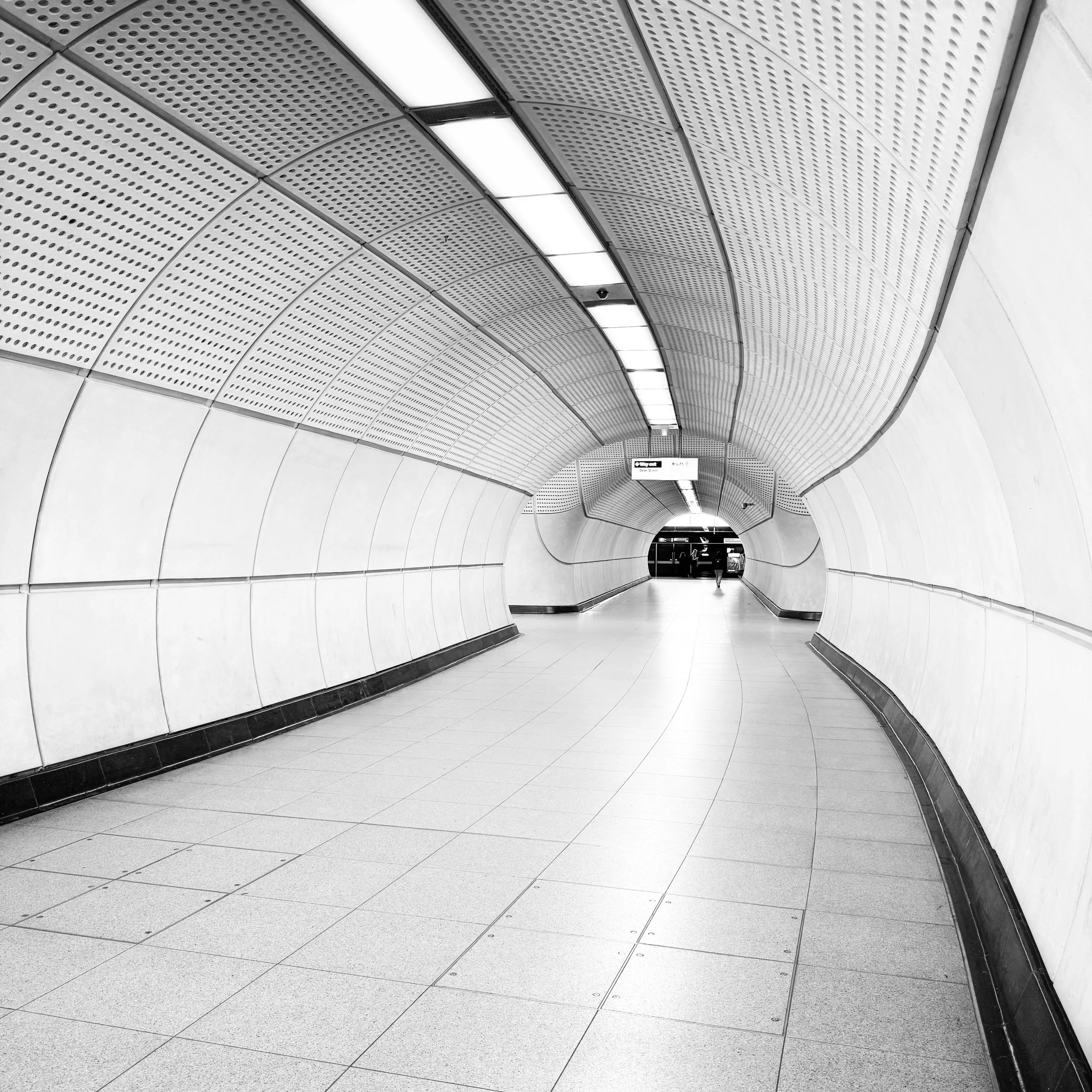 Tunnel Vision

The strong lines leading you down the tunnel, a clinical feeling from the brightness.