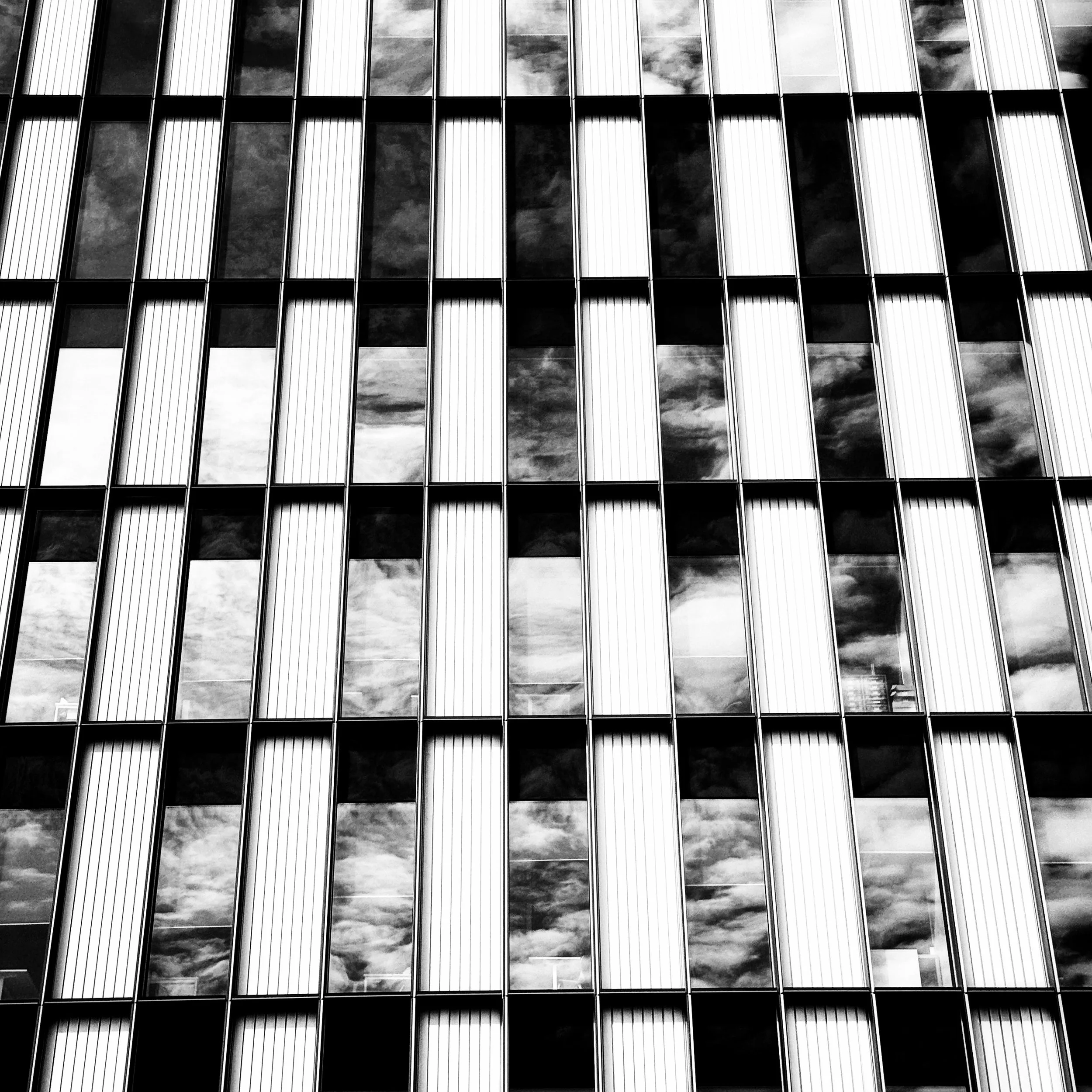 Cloud Reflection

Structure and the environment brought together, cloud formations popping out in the reflections.