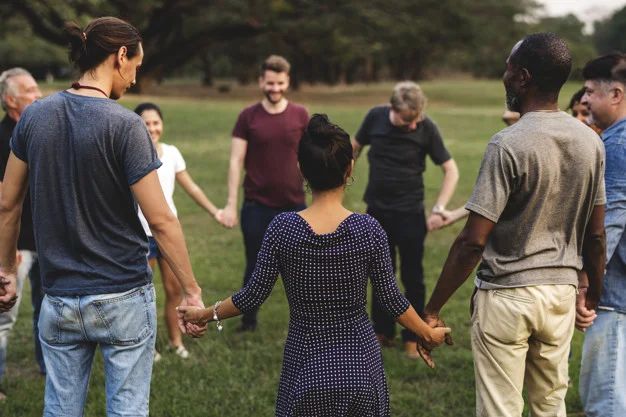 People Praying Together Outside