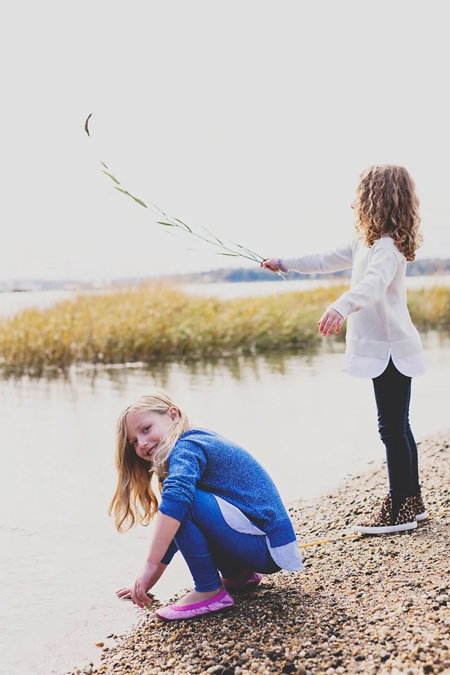 lifestyle photography sisters playing beach haven new jersey