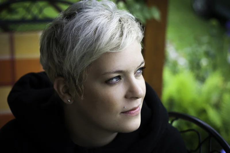 Although this background is rather busy, the photographer blurred it nicely by using a shallow depth of field (you can also use the "portrait" mode on your camera). This puts the focus back on the subject. Photo by Milan Jurek.