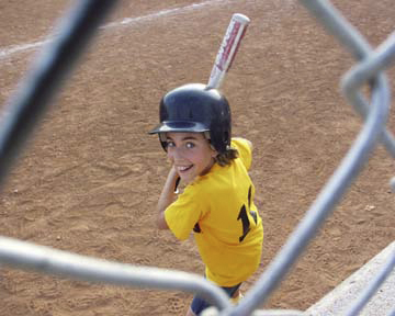 Here, a chain link fence makes a great frame. Just make sure your focus point isn't focusing on the fence.