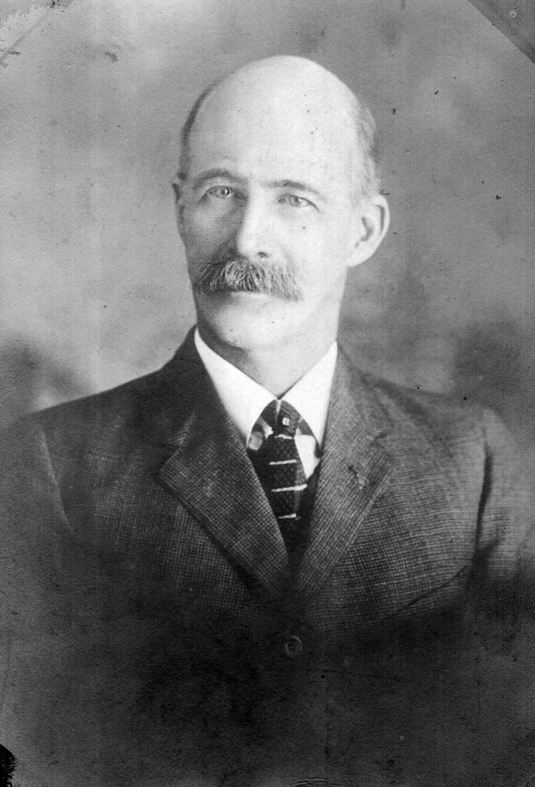 Cropping the white edges keeps Photoshop's Auto Tone from thinking Uncle Willie's white collar is supposed to be medium gray.