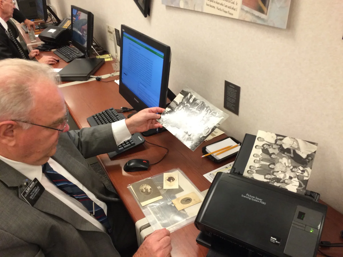 Scanning my large photos in the Kodak batch scanner.