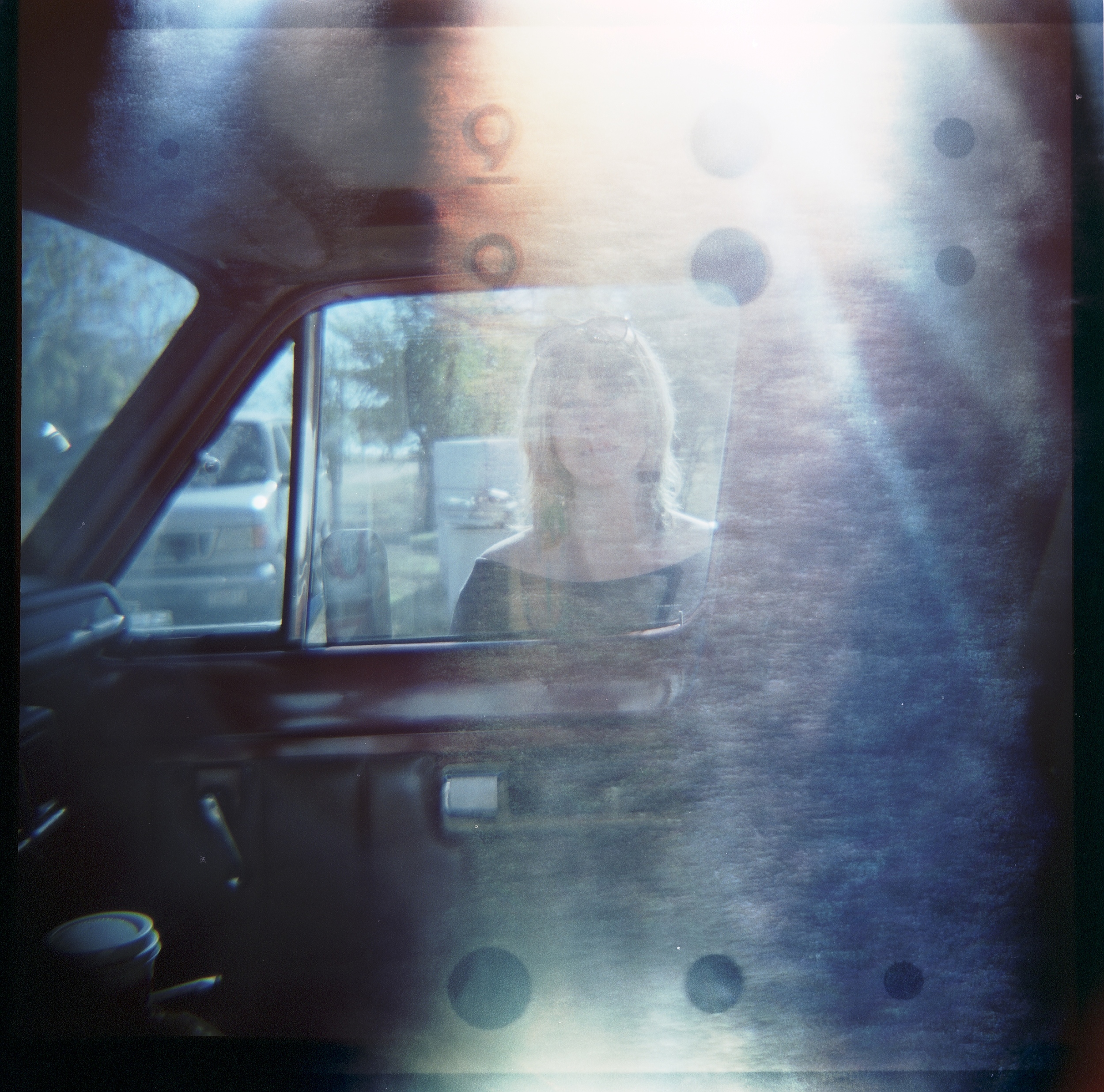 Corinne Through Car tumbl.jpg